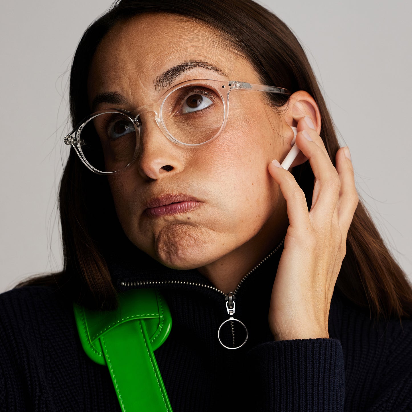 Front view of a woman wearing IZIPIZI Reading Glasses - Crystal Clear - Lightweight Plastic Frame - Flexible Rubber Arms - Unisex Round Shape D - Stylish Transparent Readers for Everyday Vision Comfort