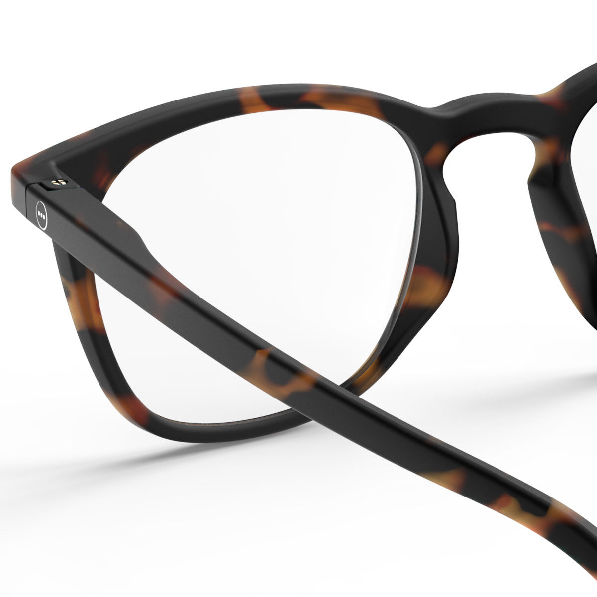 Izipizi shape e tortoise reading glasses close up of back left hand side on white background
