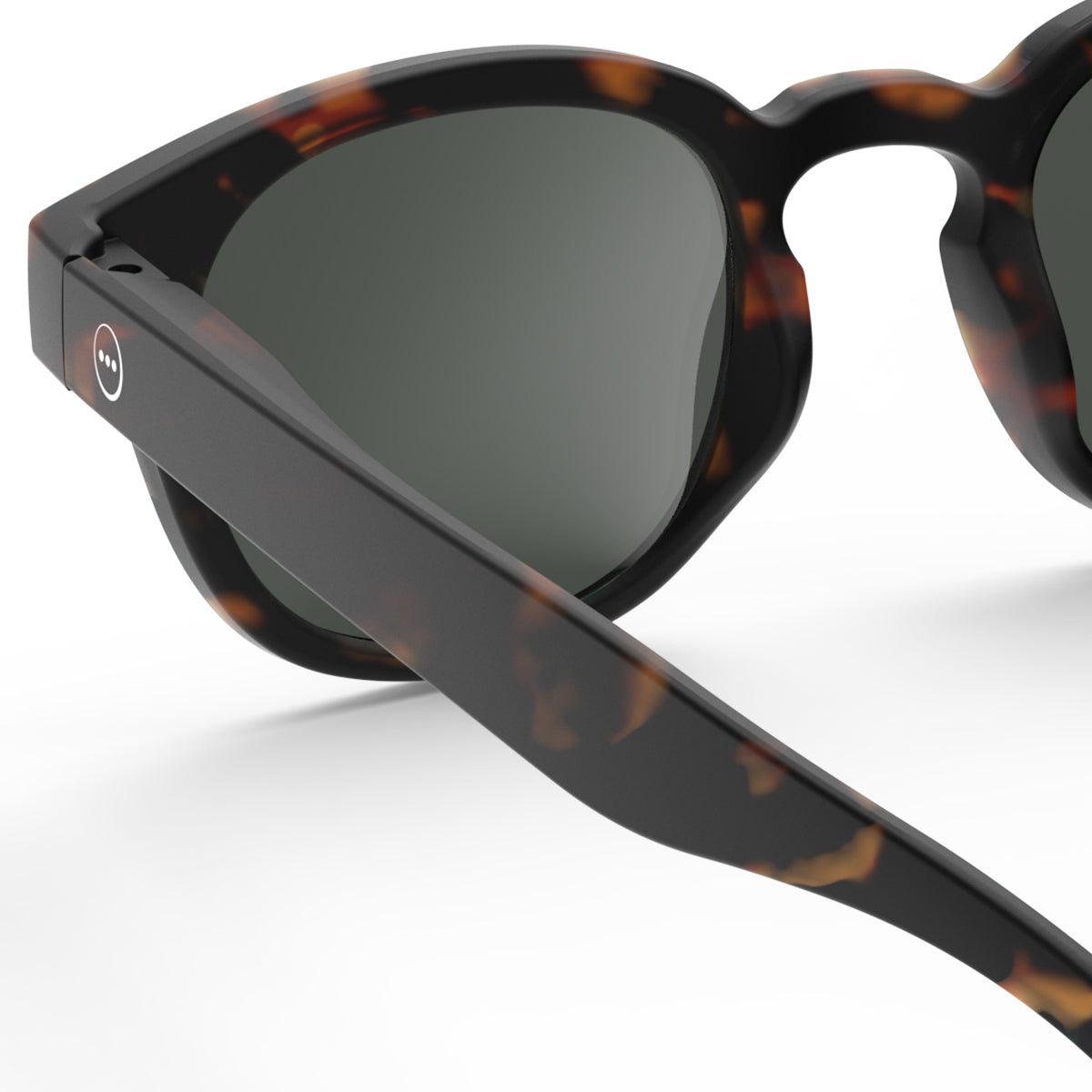 Izipizi junior sunglasses shape c tortoise close up of back left hand side on white background
