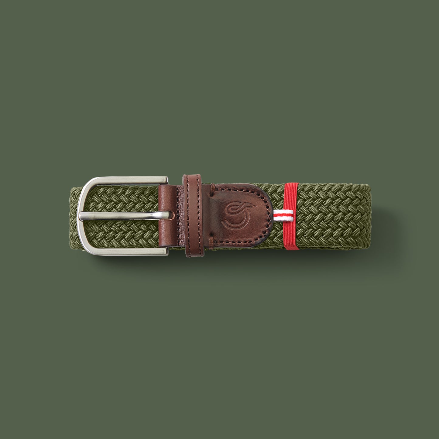 La Boucle mono edinburgh woven belt folded on green background
