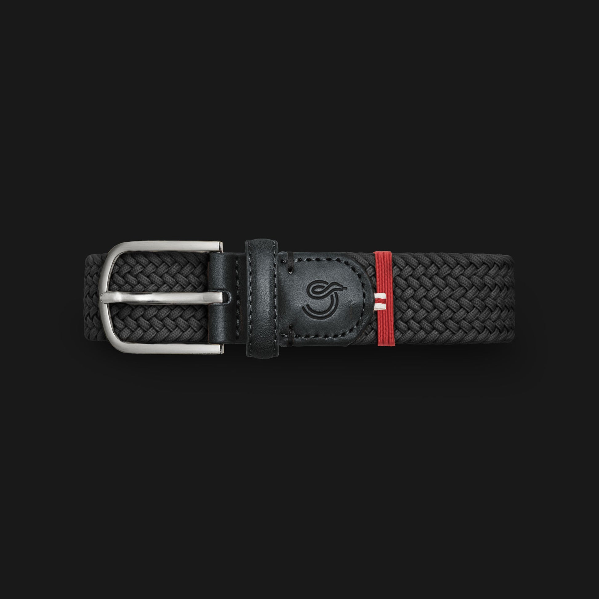 La Boucle mono London woven belt folded on black background