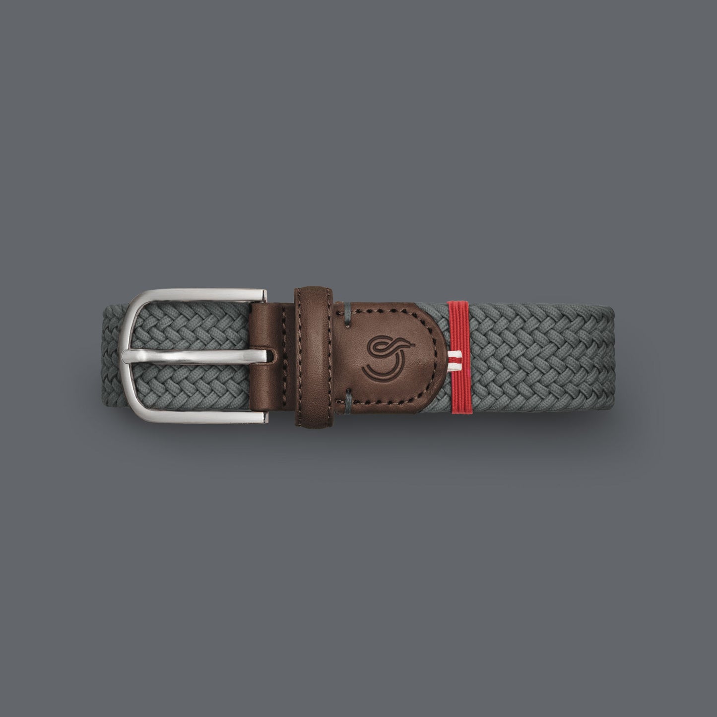 La Boucle mono New York woven belt folded on Grey background