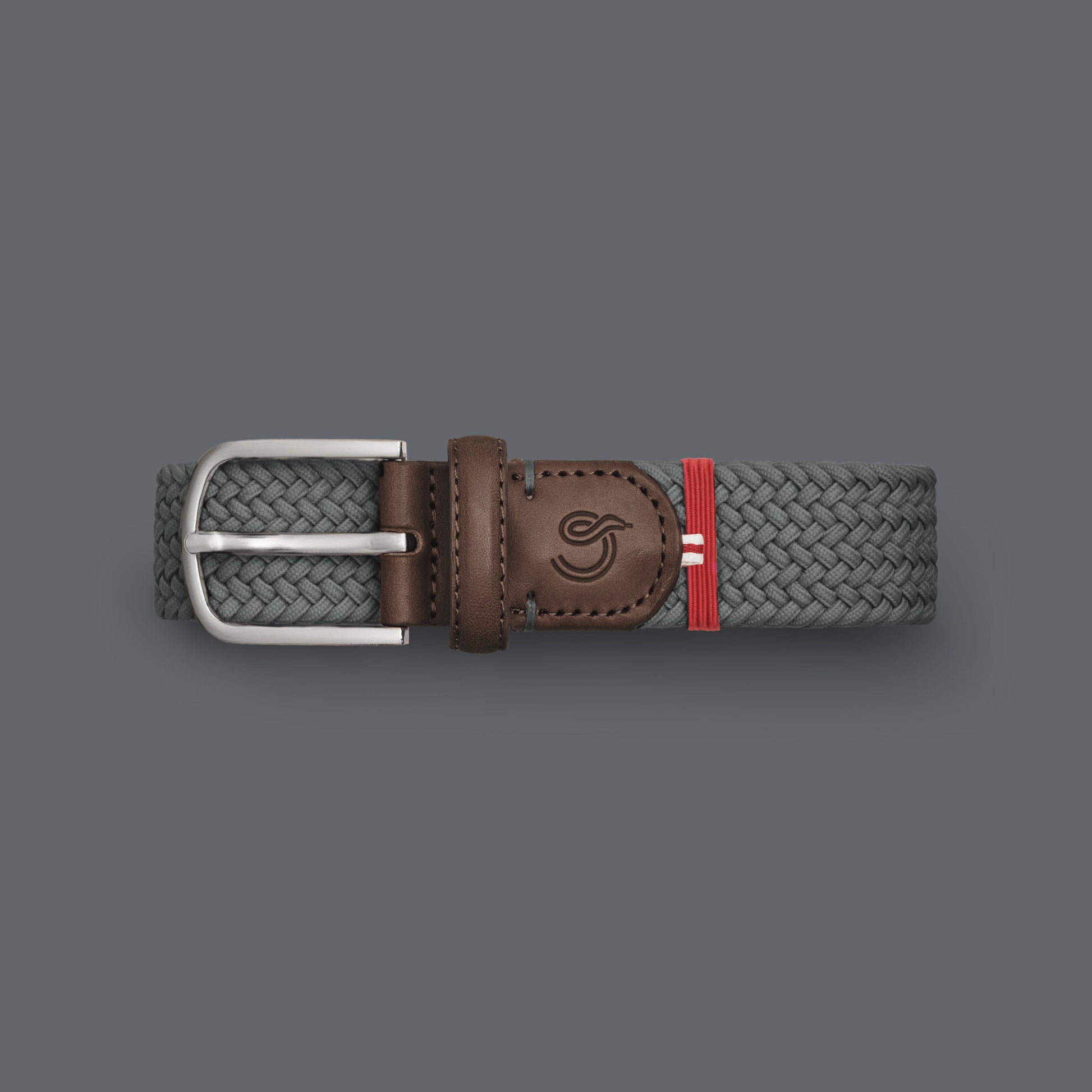 La Boucle mono New York woven belt folded on Grey background