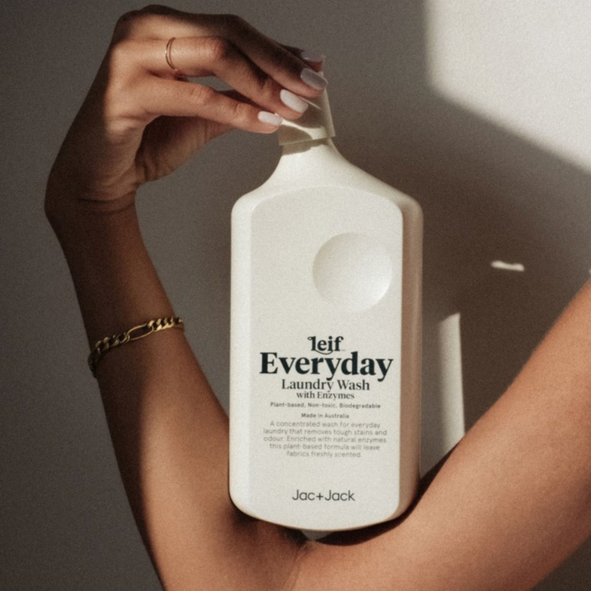 Close up of woman resting Laundry Wash 750ml Everyday on her elbow and arm