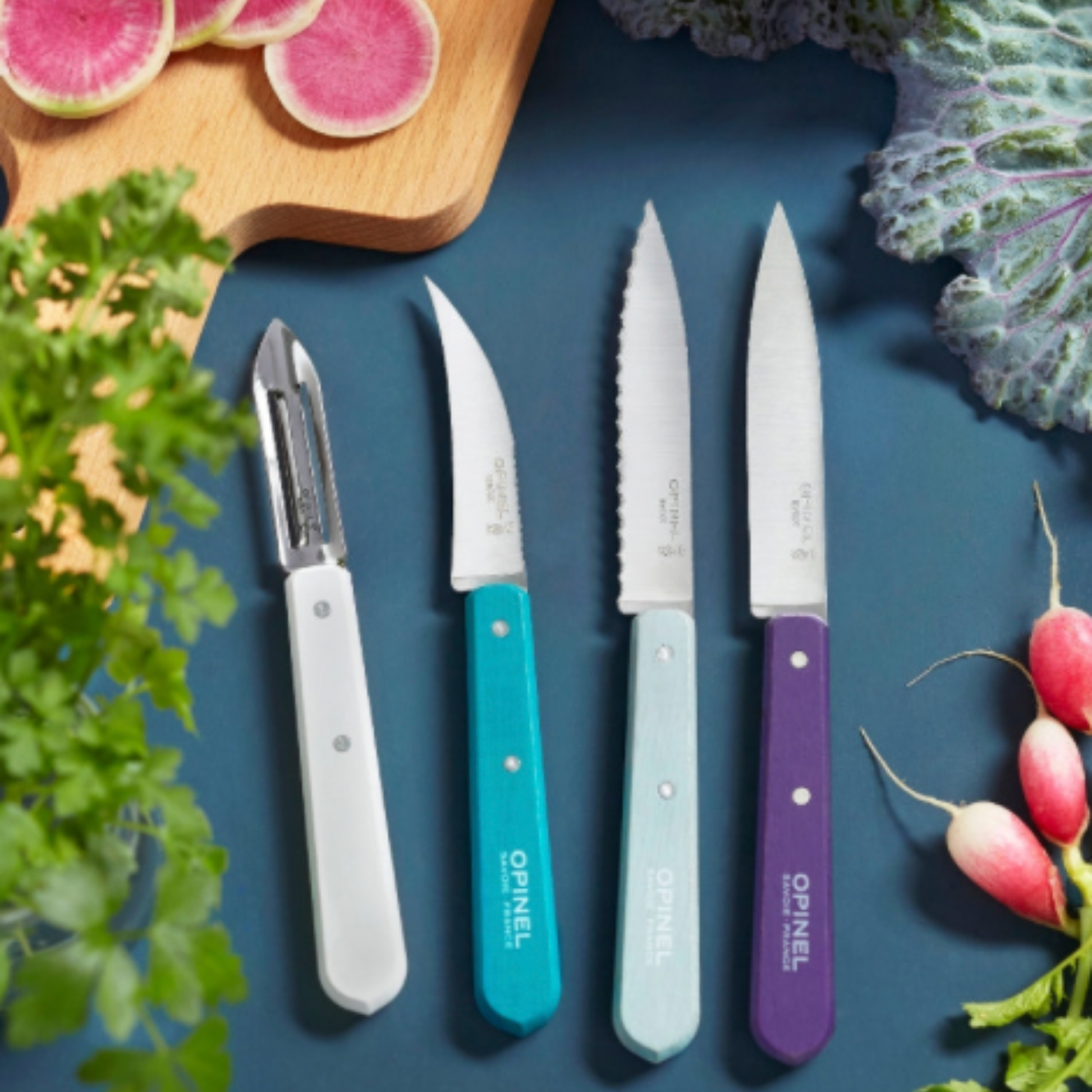 Opinel Les Essentiels Kitchen Knife Set SS Art Deco in kitchen with chopping board and radishes 