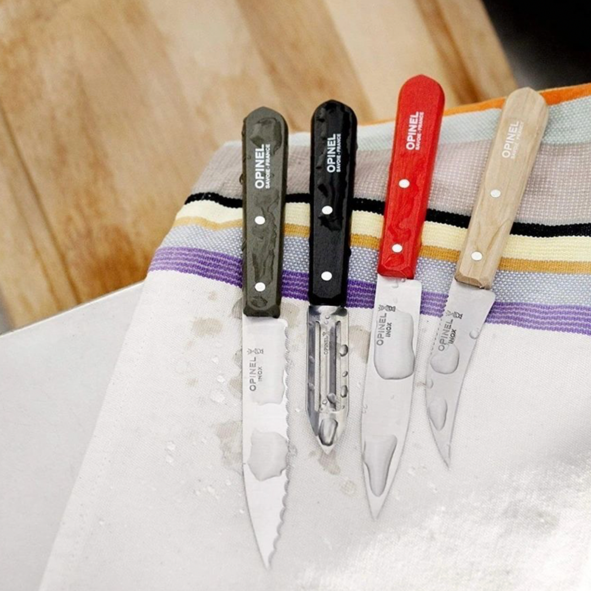 Opinel Les Essentiels Kitchen Knife Set SS Loft freshly washed drying on teatowel and chopping board