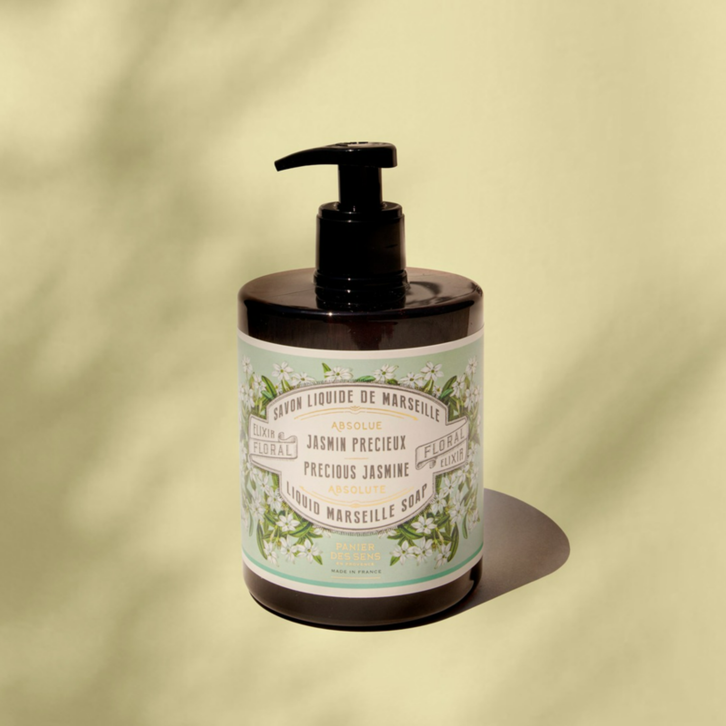 Panier Des Sens Marseille Liquid Soap Precious Jasmine out of packing with green background and soft lighting