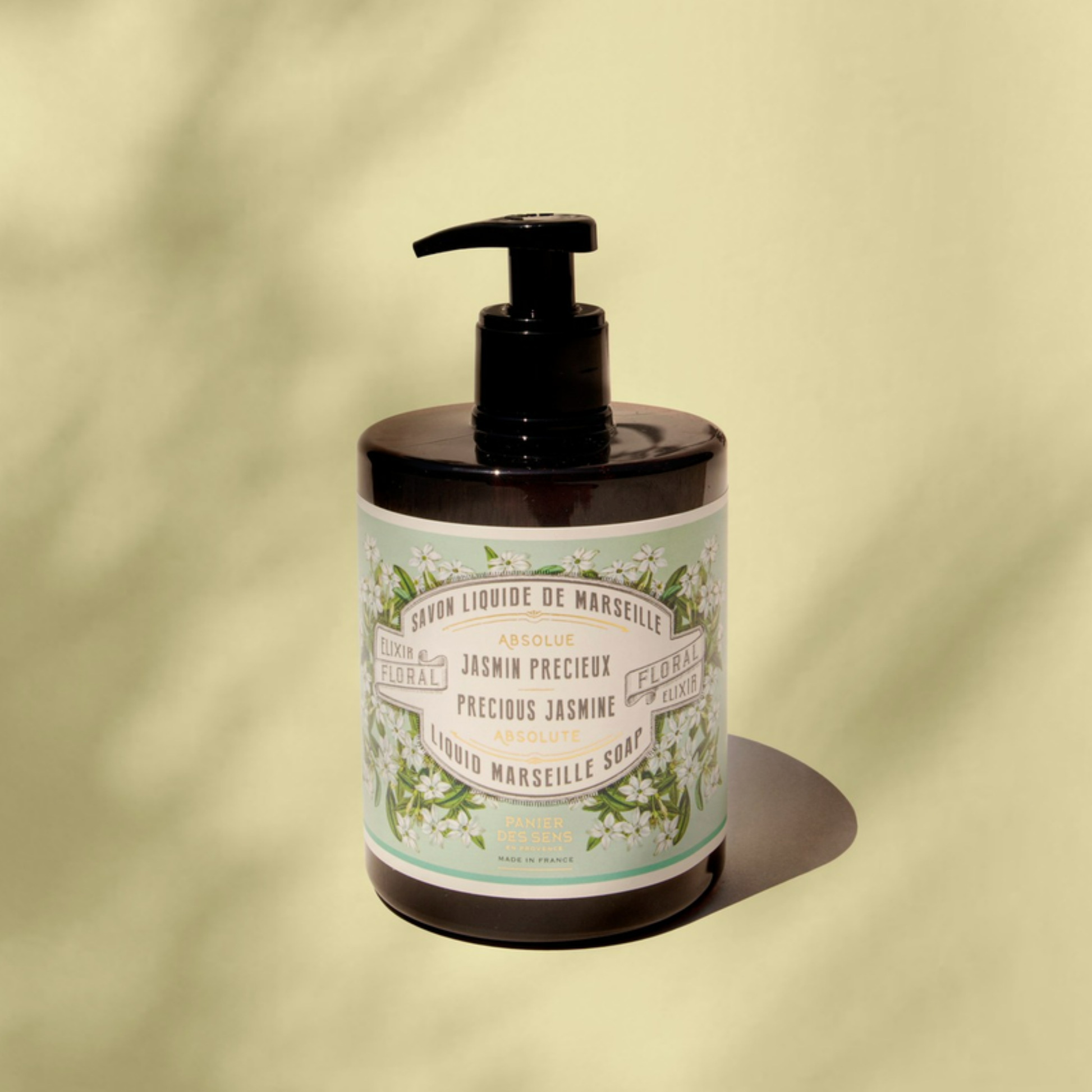 Panier Des Sens Marseille Liquid Soap Precious Jasmine out of packing with green background and soft lighting