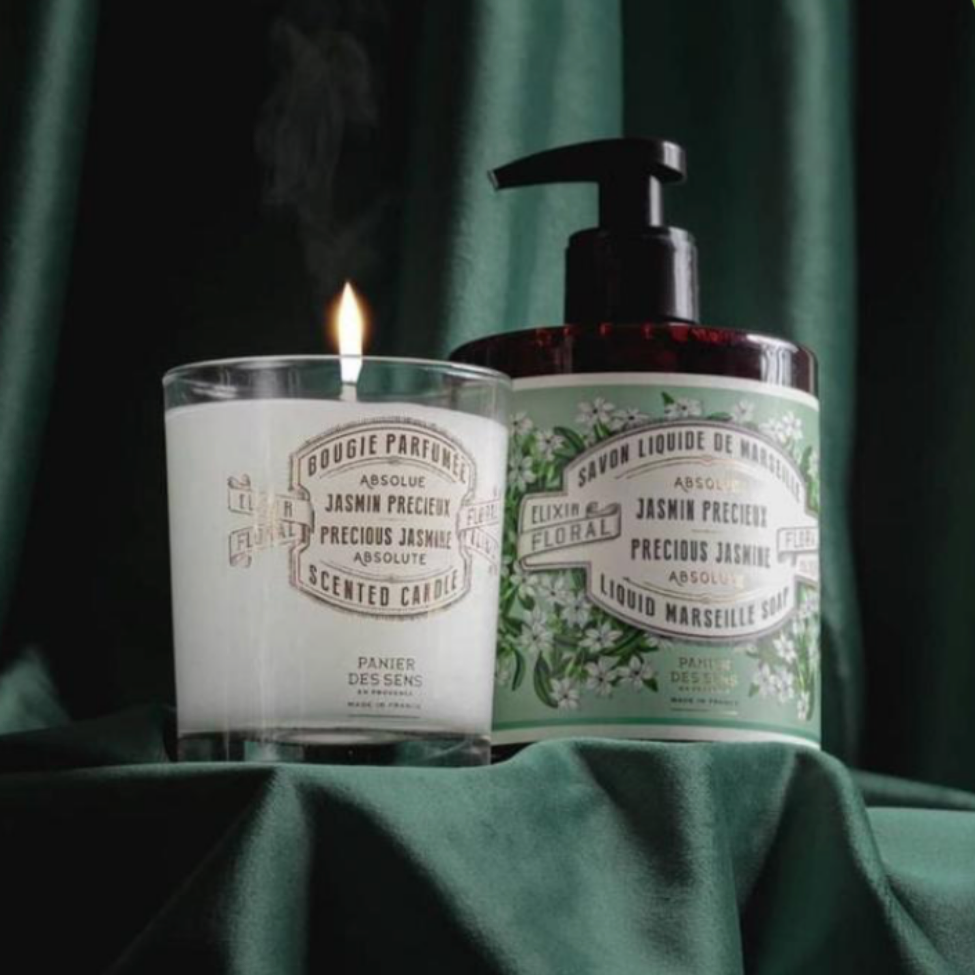Panier Des Sens Marseille Liquid Soap and Candle Precious Jasmine styled on dark green backdrop