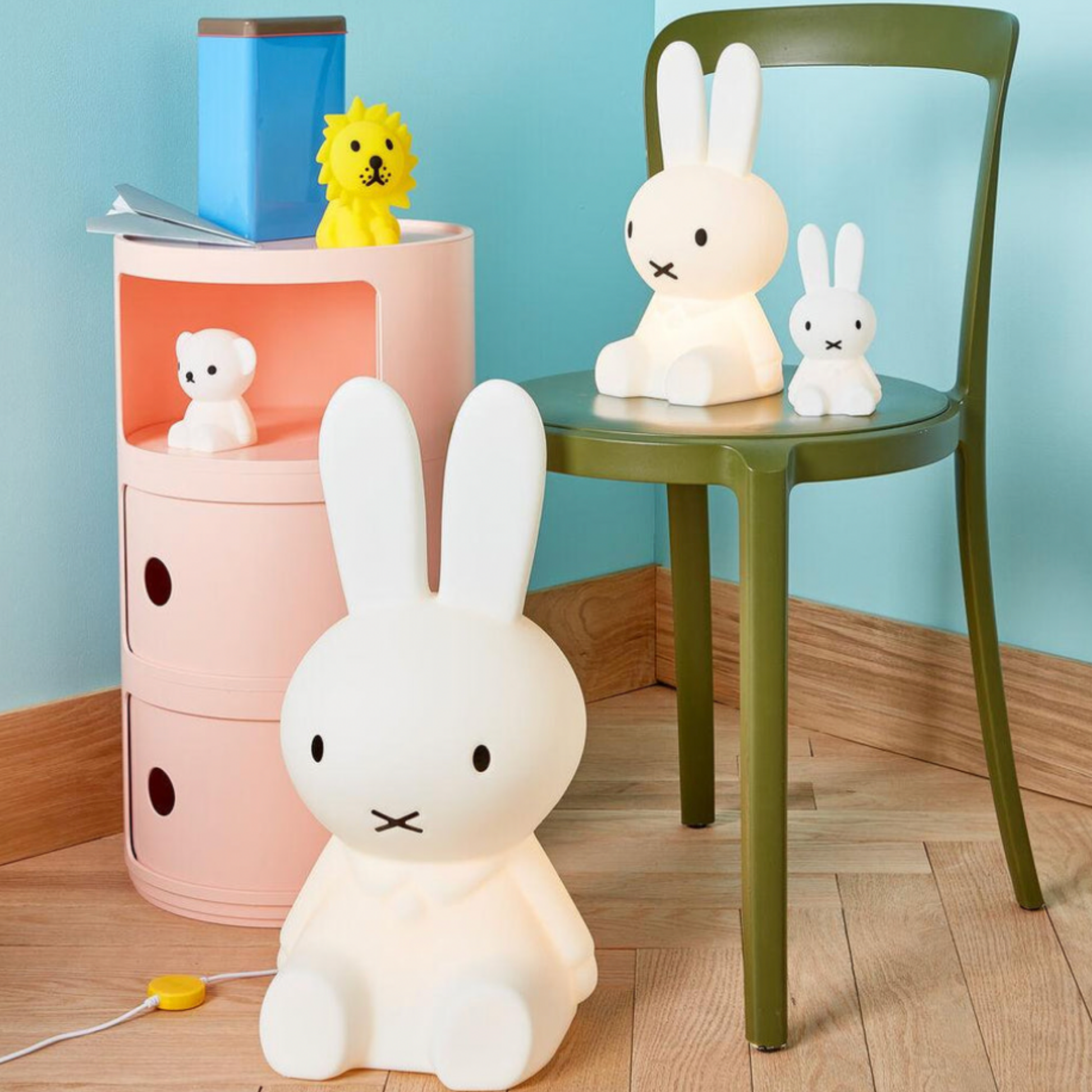 Assortment of Mr maria night light6s including 15cm Miffy night light on a chair and side table.