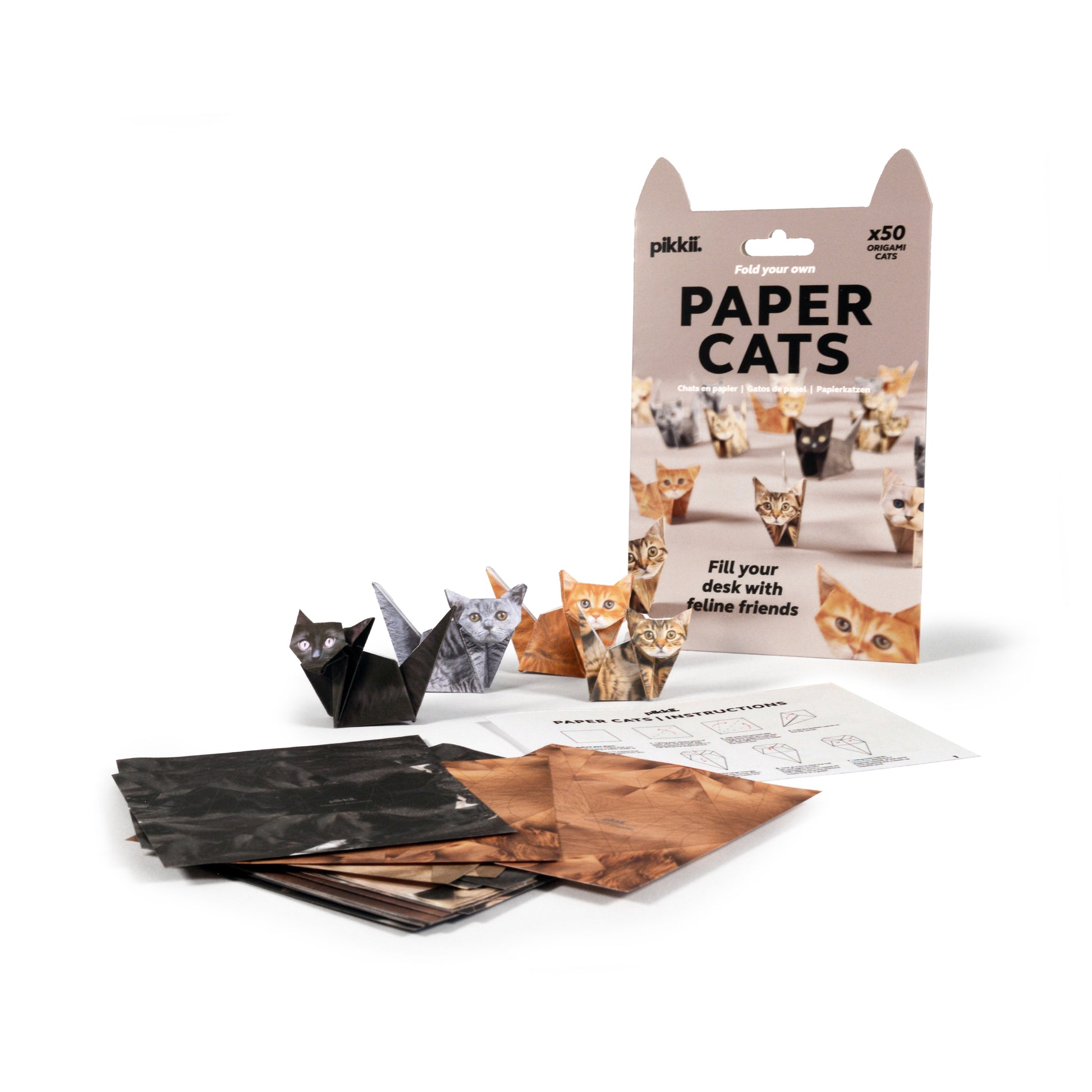 Paper cats and foldable papers from Paper Cats origami kit - foldable multi-color FSC paper set featuring 50 cat and kitten designs, eco-friendly paper material with soy-based printing, includes step-by-step instructions for creating assorted life-like paper cats.
