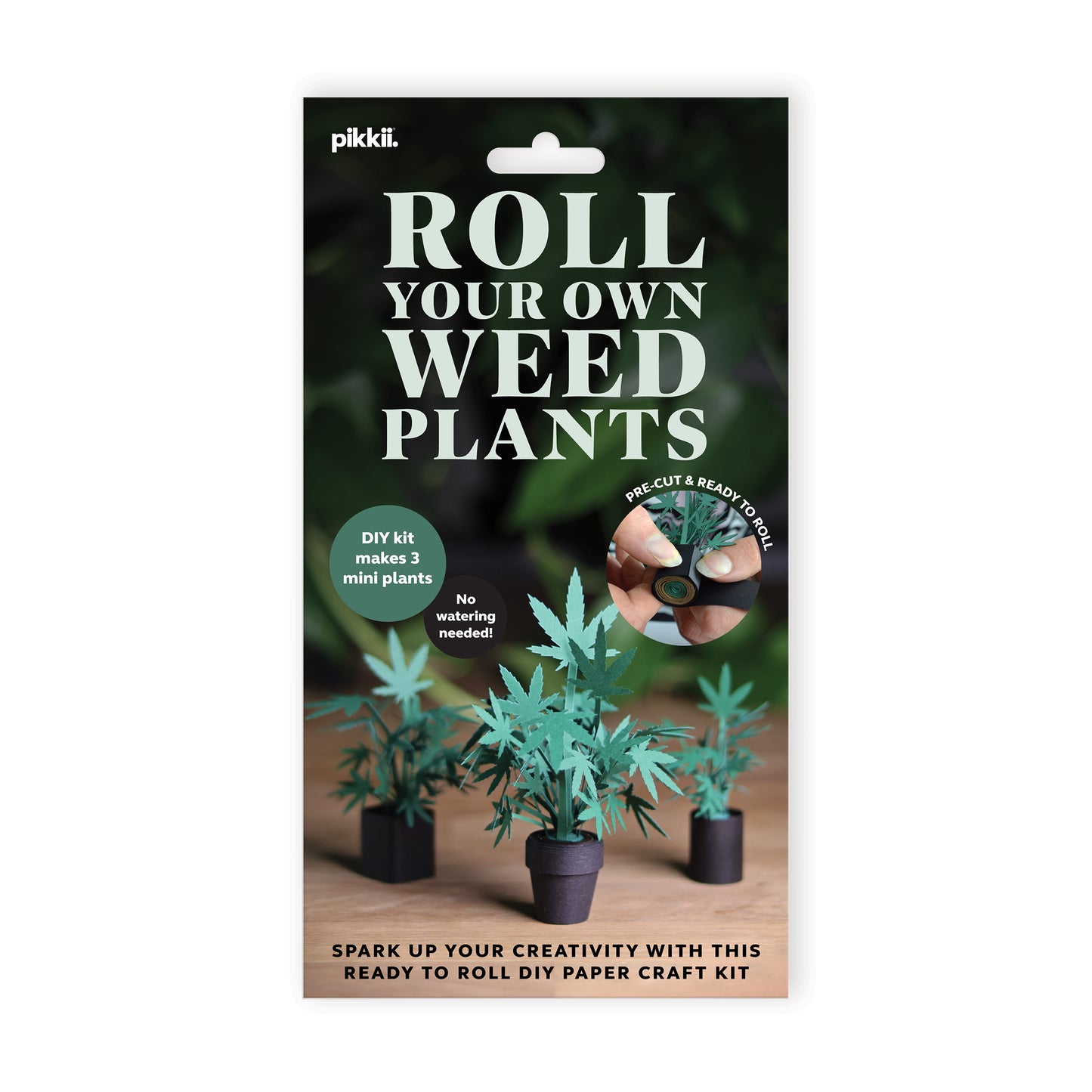 Front view of Plastic-free packaging from Pikkii Roll Your Own Weed Plants paper craft kit - premium FSC-paper DIY kit with pre-cut sheets for creating three paper marijuana plants, soy-ink printing, 140×260×5 mm size, includes step-by-step instructions.