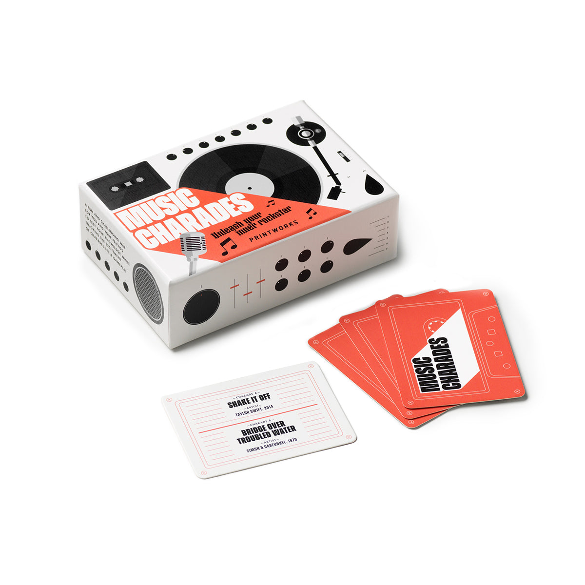 Printworks music charades card game box close up on white background with cards on an angle