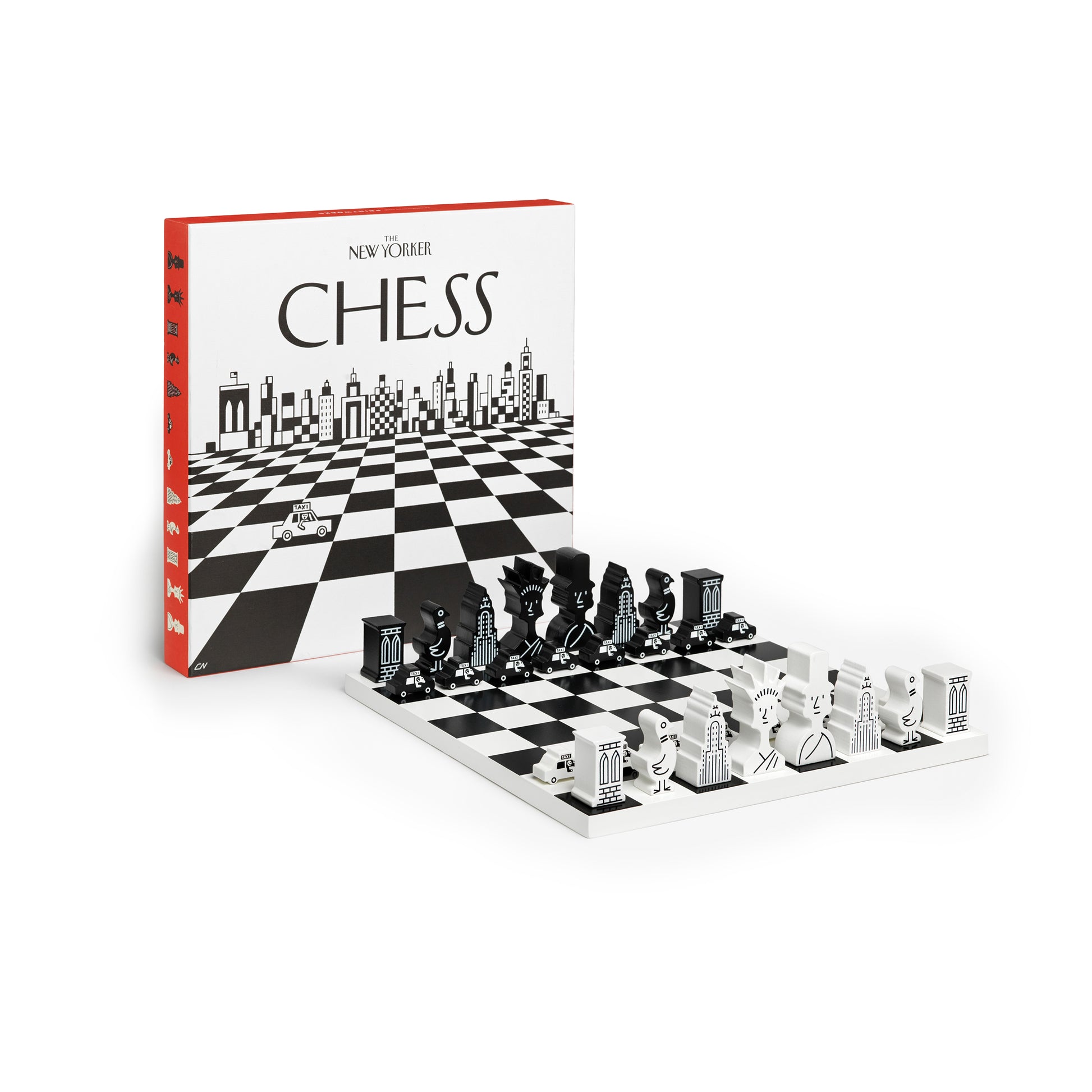 Printworks classic chess game The New Yorker Edition set up with wooden pieces next to the box lid standing up on a white background