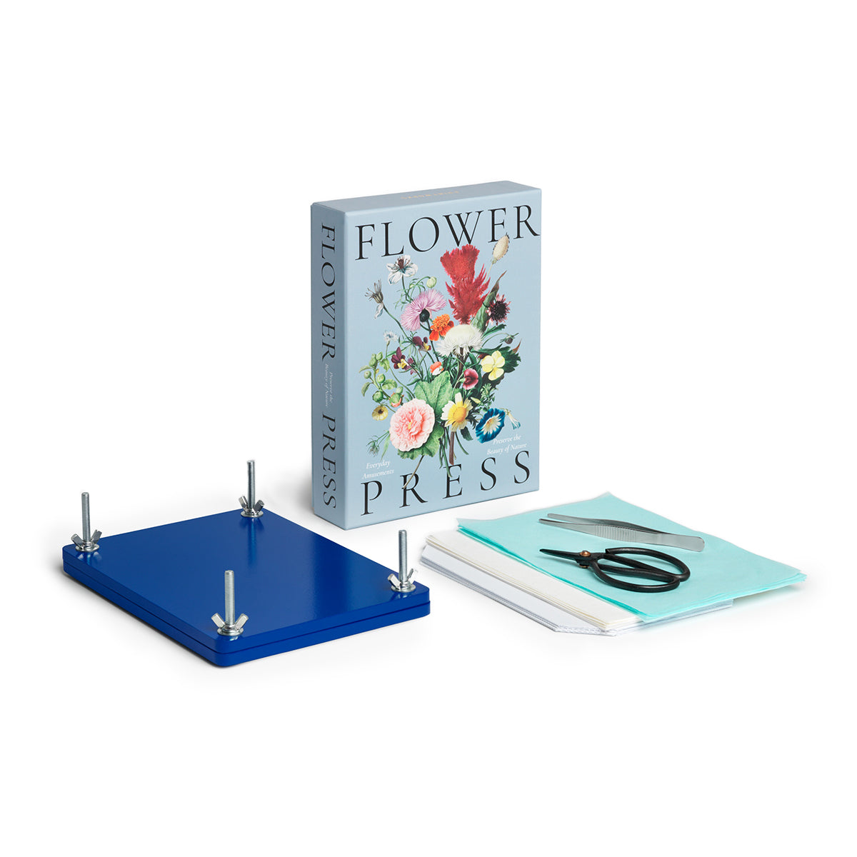 Printworks flower press kit box and components lined up on square grid on white background