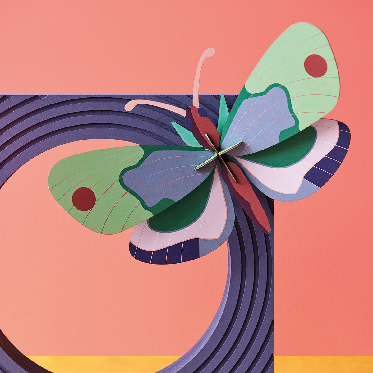 Studio Roof A4 mint forest butterfly wall art on purple circle on peach background