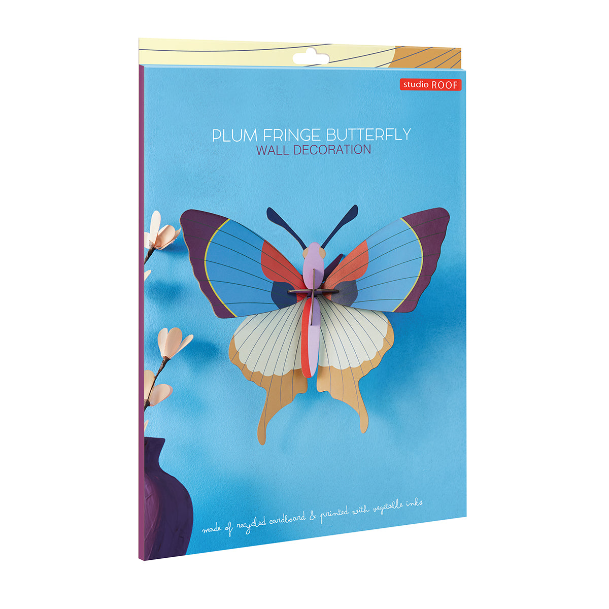 Flat card packaging of Studio RoofA4 plum fringe butterfly wall art on a white background