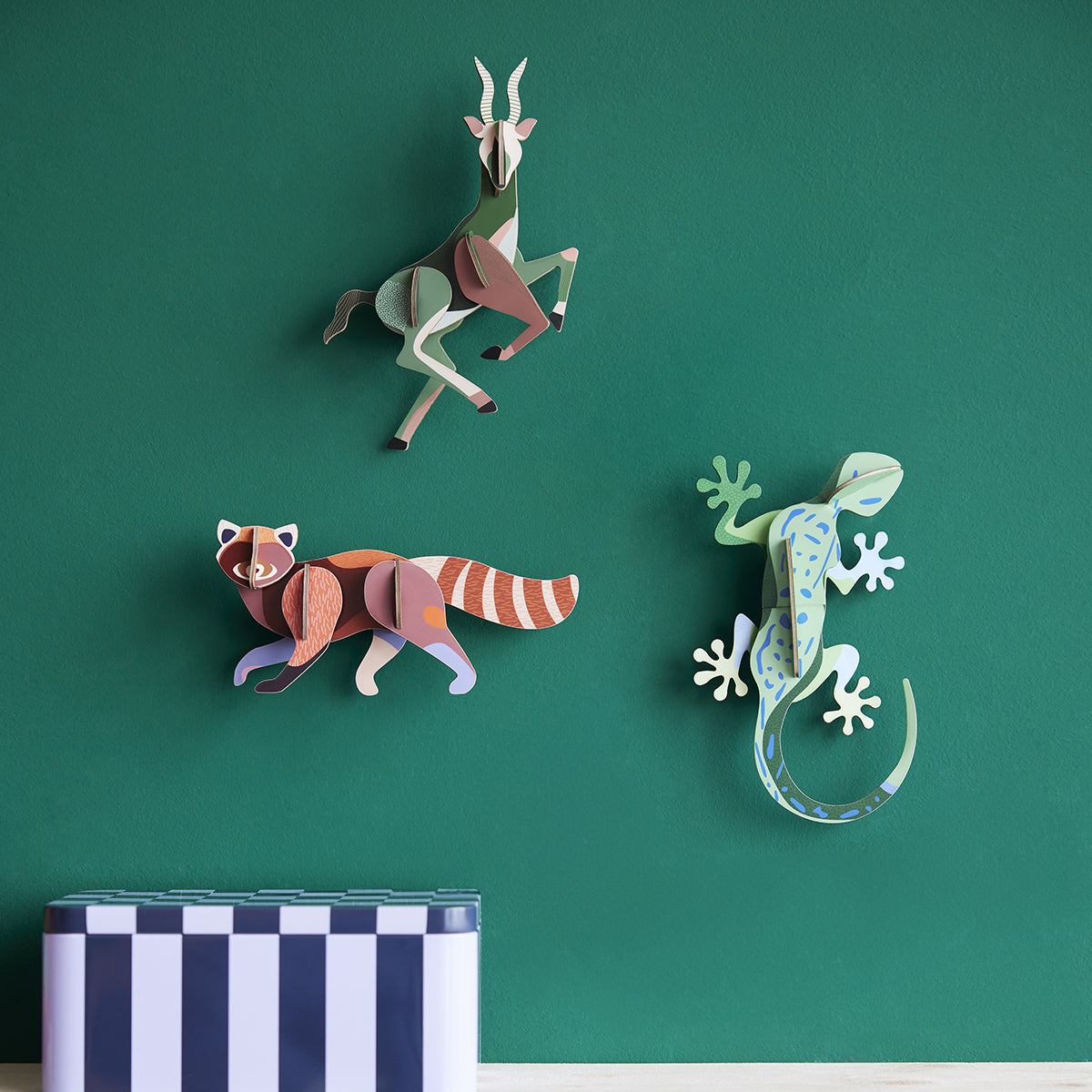 Studio Roof B7 gecko animals wall art and other animals on deep green wall