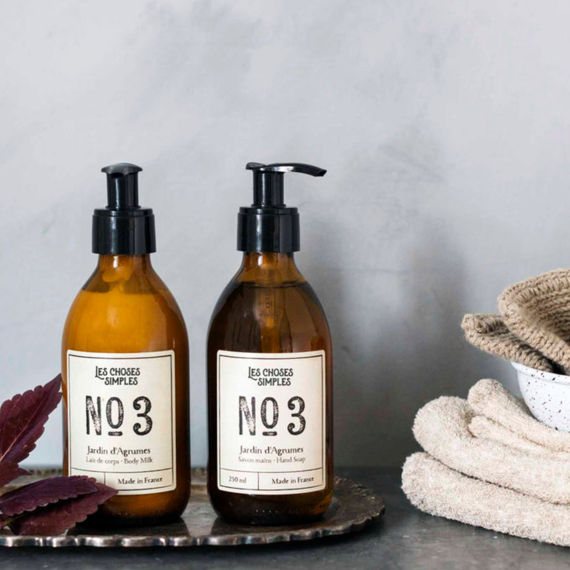 Shea Butter Body Milk 250ml Jardin des Argumes on display in bathroom with 250ml Jardin des Argumes Hand Wash
