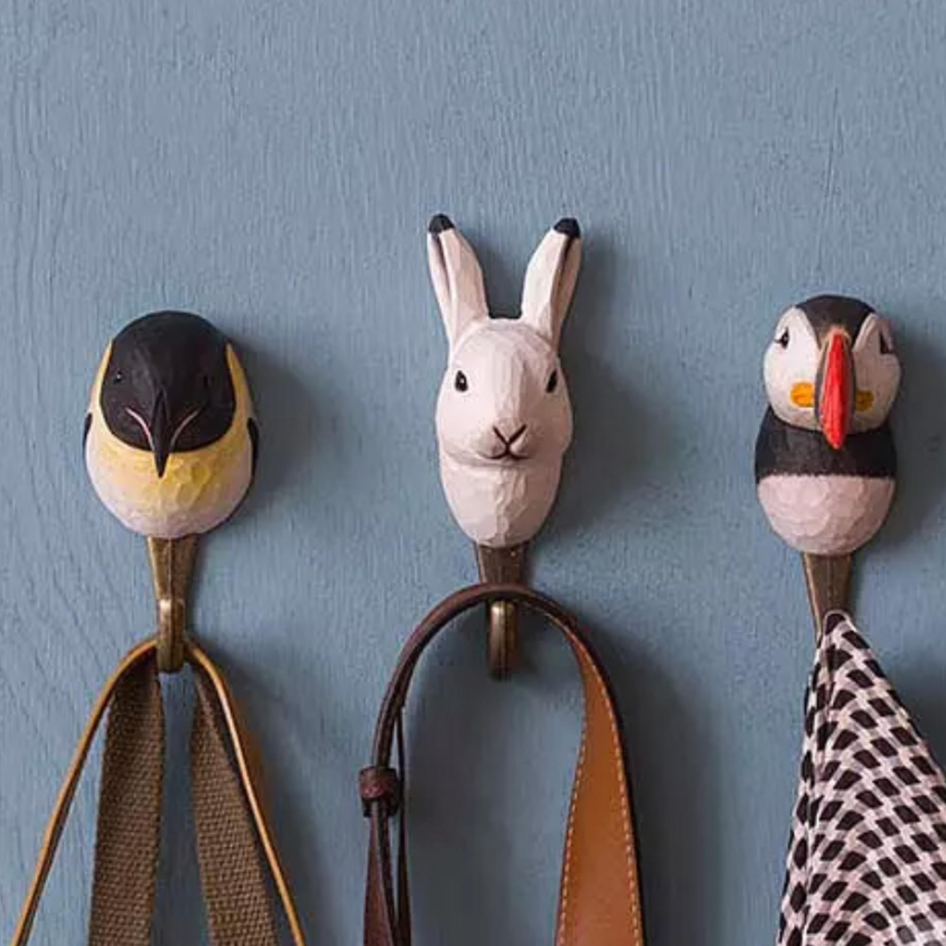 Wildlife Garden Wall Hook Arctic Hare on display hung on wall holding bags with other animal hooks from Wildlife Garden Wall Hook range 