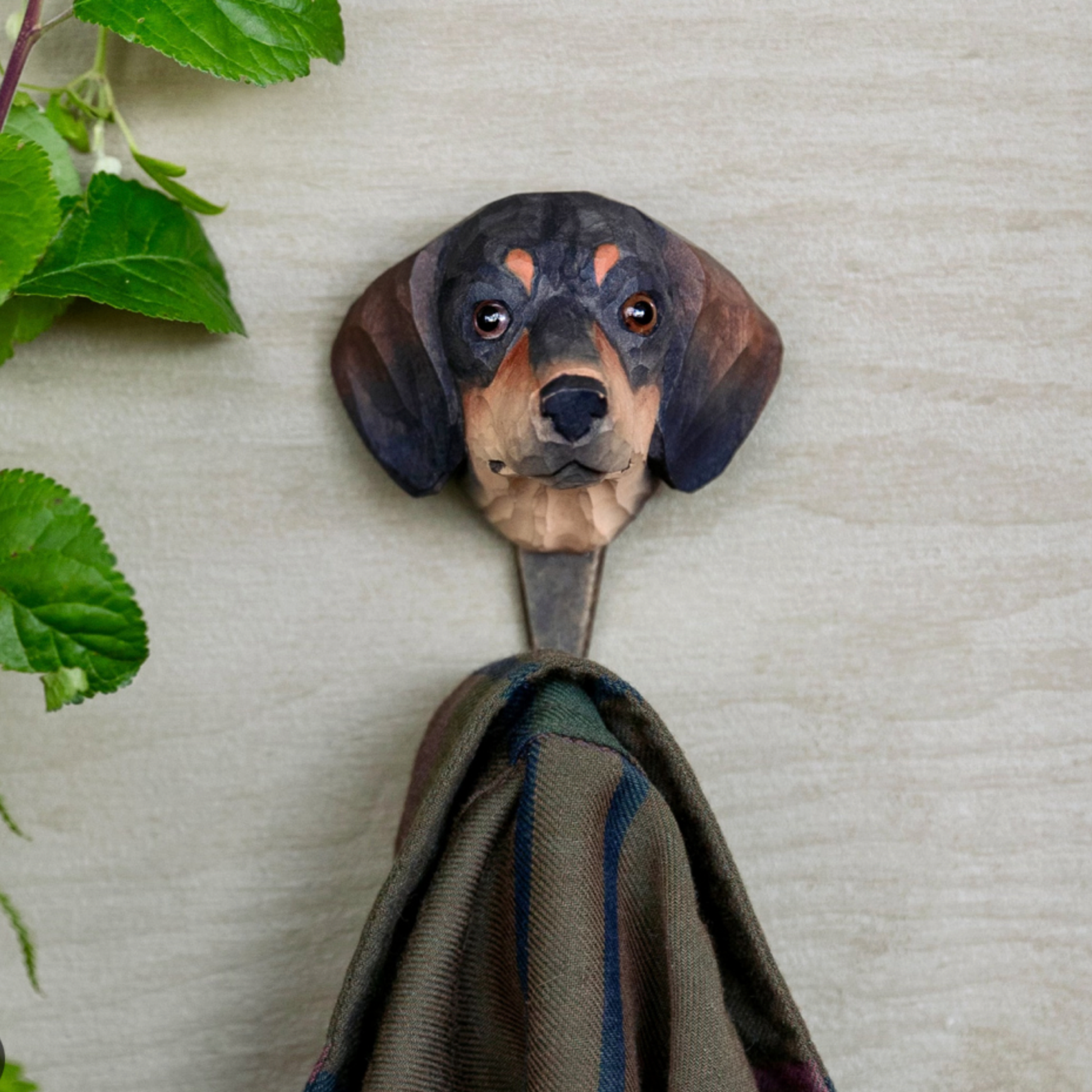 Wildlife Garden Wall Hook Dachshund on display close up hanging coat near leaves 