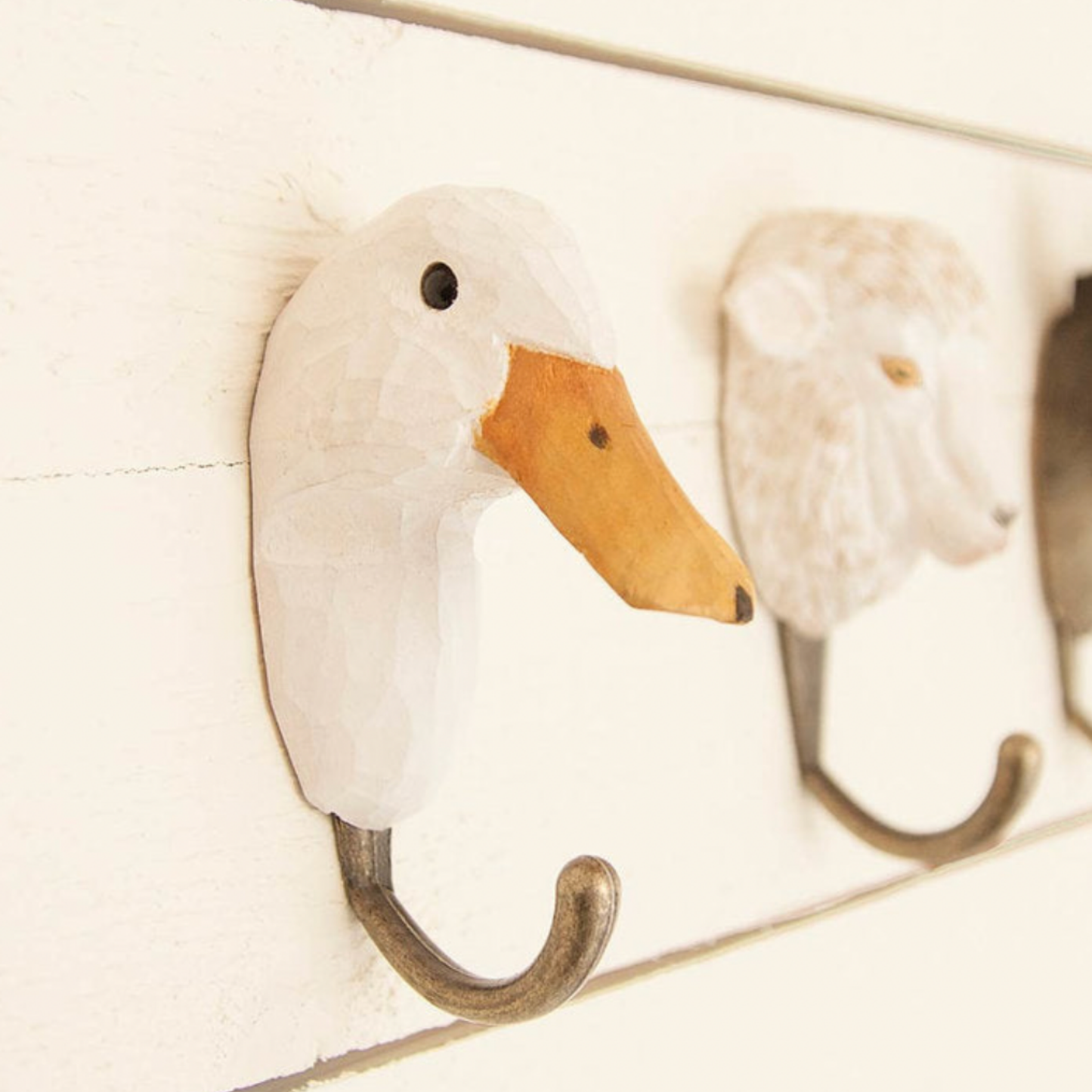 Wildlife Garden Wall Hook Duck Close up attached to wall with Wall Hook range visable in background