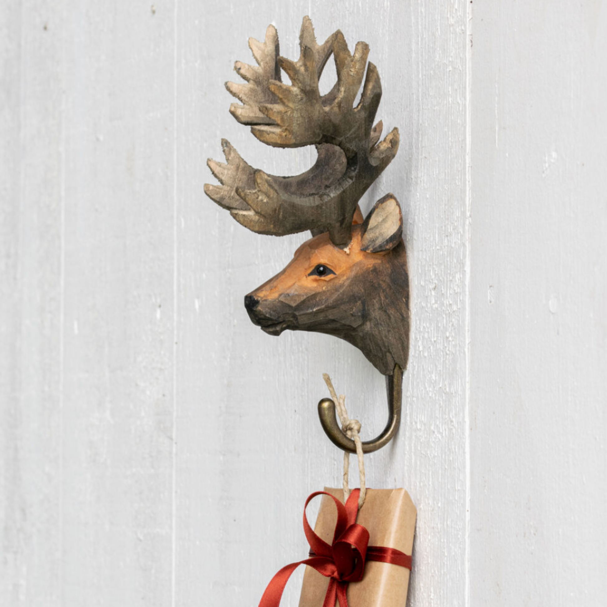 Wildlife Garden Wall Hook Red Deer side view on display on wall with present hanging from hook 