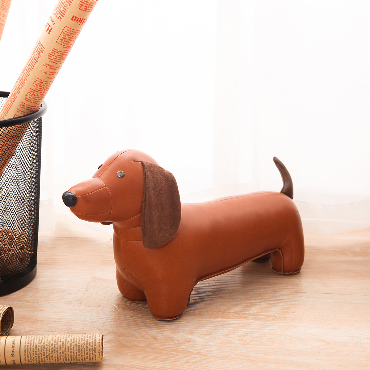 Zuny's Bookend Classic Dachshund Tan shown on a desk