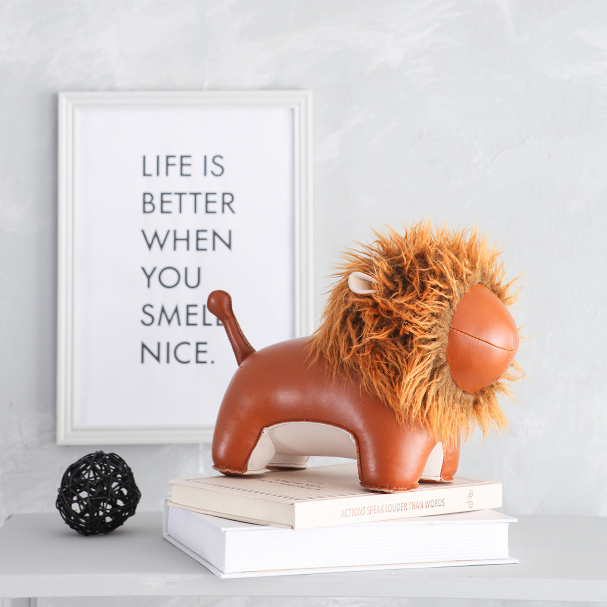 Zuny's Bookend Classic Lion Tan shown on a desk