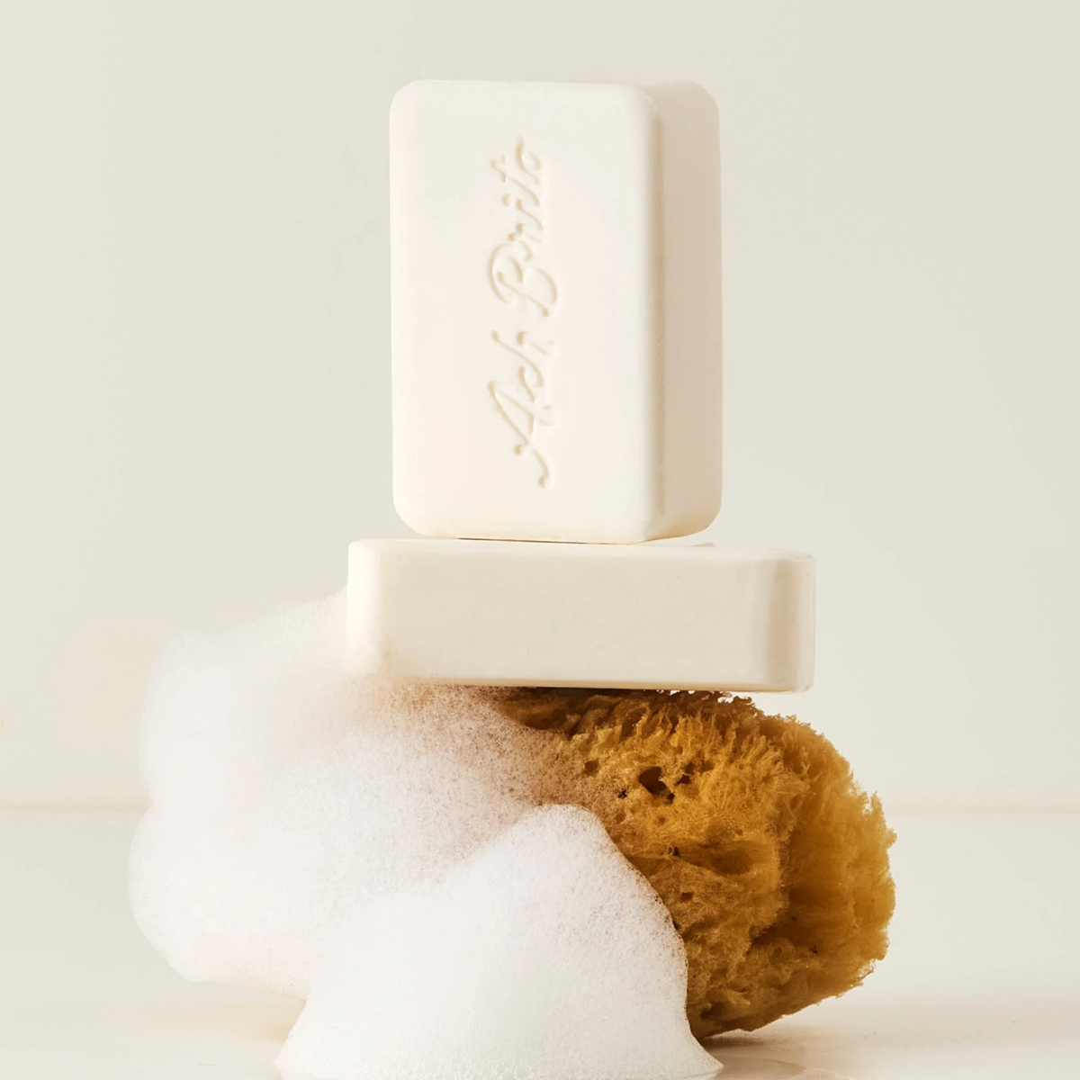 Brush and sponge with Ach Brito SPA Mosturizing Soap Donkey Milk made with vegetable soap base donkey milk that offers unique texture and comfort to the skin.