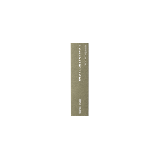 Box packaging of the Addition Studio Incense Refill Mandarin, Lime & Basil: a 15 incense stick in a box, with a blend of mandarin, sandalwood, lime, basil, and aniseed essential oils.