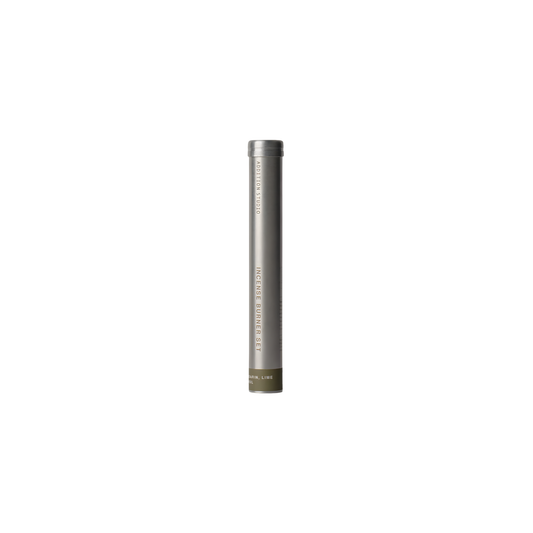 Aluminum tube of the Addition Studio Incense Set Mandarin, Lime & Basil (with Holder): 15 incense sticks with holder. A blend of mandarin, sandalwood, lime, basil, and aniseed essential oils.