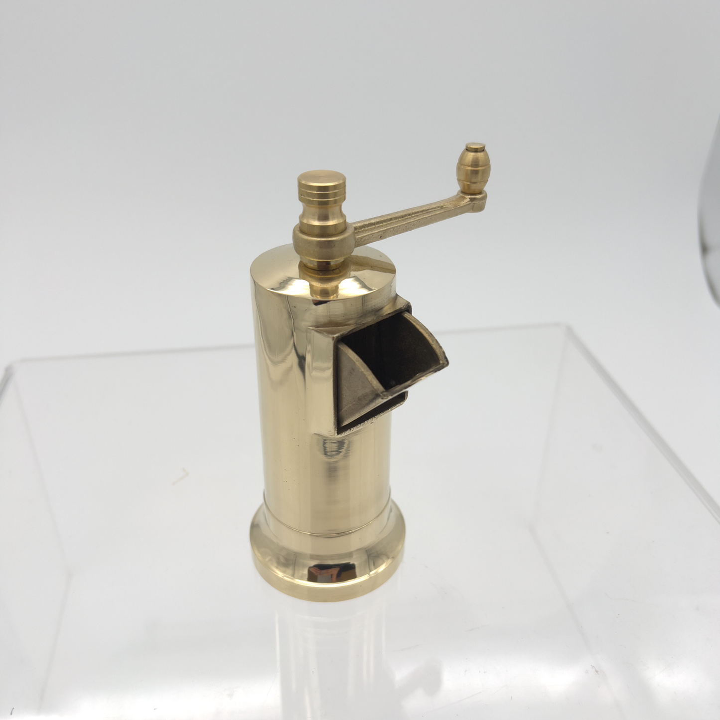 Side view and open Alexander Mills Cast Brass Pepper Mill #006 - Cast brass, 135mm / 5.3" tall, 3DCut metal grinding system, adjustable coarse-fine, side refill socket, handcrafted Greek, durable polished body, easy-grind long arm, open-bottom flanged base, kitchen tool, flavor-maximizing pepper grinder.