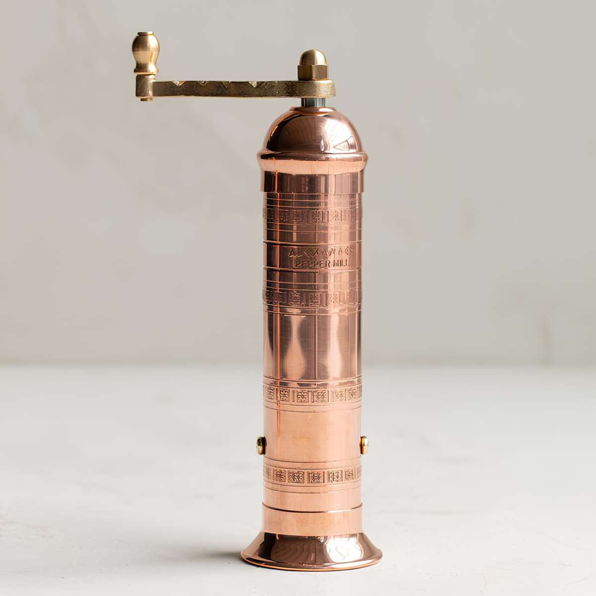 Close up of the Alexander Mills Copper Pepper Grinder 20cm which has 100% metal mechanism with 3DCut system to grind peppercorns fine or coarse.