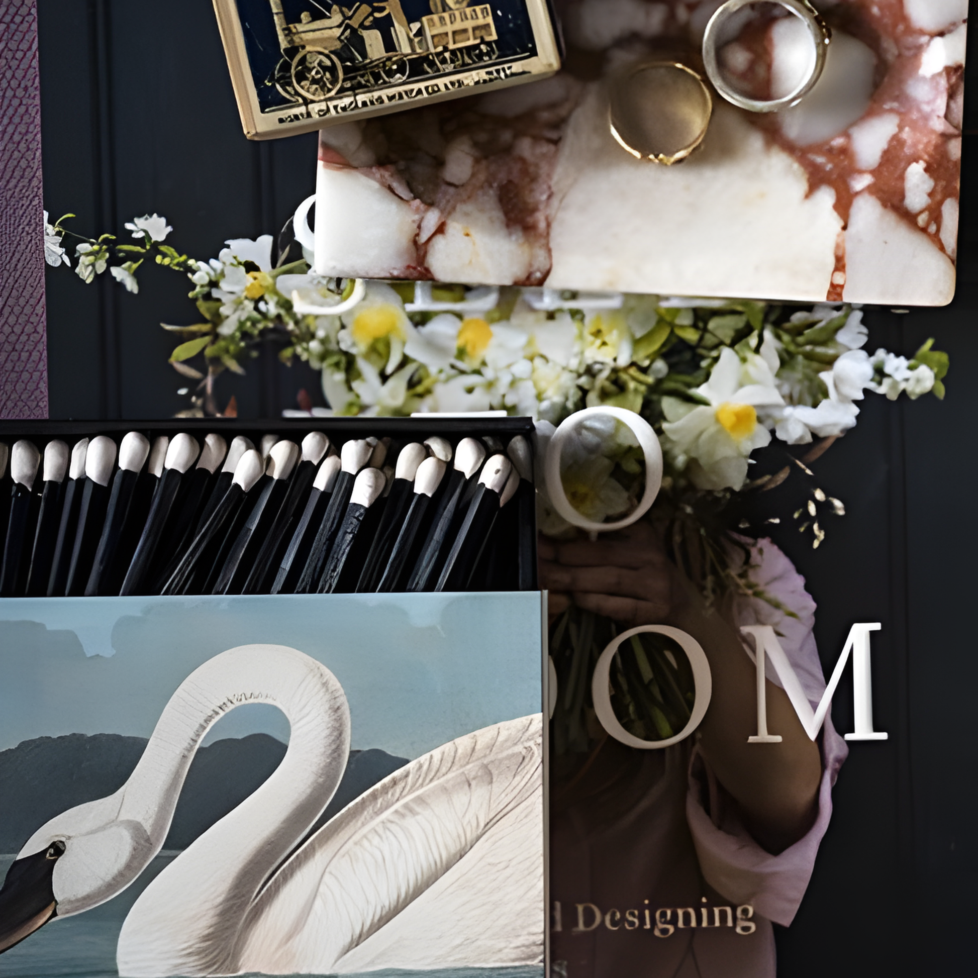 Upclose view of the white tipped matches with the front view of Archivist Common American Swan Matches - Square Matchbox with Swan and Lily Pad Design - 125 Black White-Tipped Matches in Black Tray - FSC Wood, UK Made, Eco-Friendly Decorative Match Set