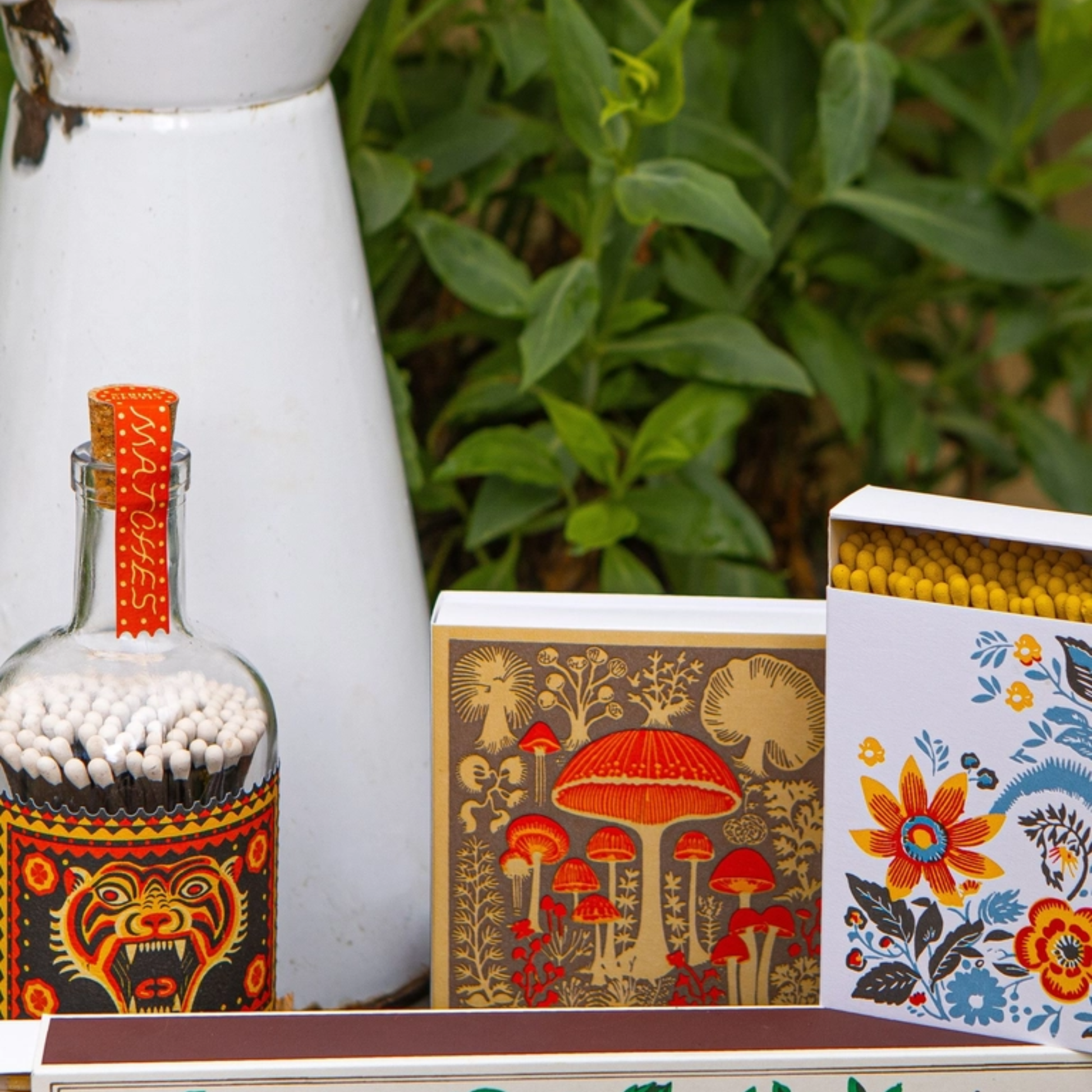 Seen in the right with its yellow tipped matches with other match box designs, Archivist Flower Matches - Square Matchbox with Colourful Floral Design and White Tray - 125 Natural Yellow-Tipped Matches - FSC Wood, UK Letterpress Printed, Eco-Friendly Decorative Match Set