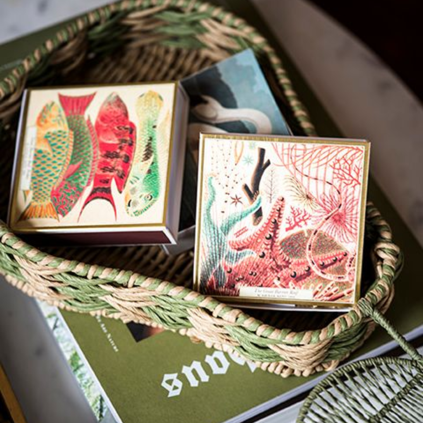 In a basket with other match boxes, Archivist Great Barrier Reef Matches - Square Matchbox with Colourful Ocean and Sealife Design - 125 Natural White-Tipped Matches - FSC Wood, UK Litho Printed, Eco-Friendly Decorative Match Set