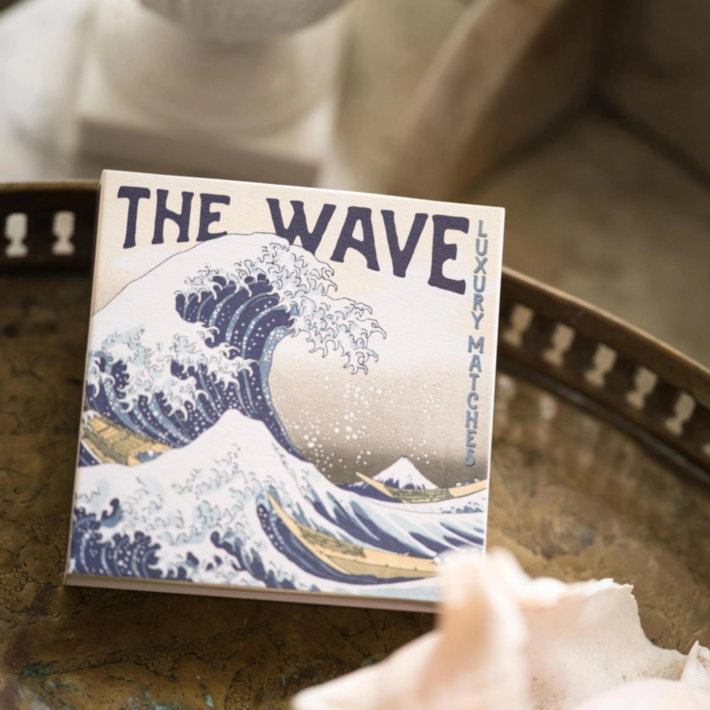In a tray front view of Archivist Hokusai Wave Matches - Square Matchbox with The Great Wave Art Design - 125 Natural White-Tipped Matches - FSC Wood, UK Litho Printed, Eco-Friendly Decorative Match Set