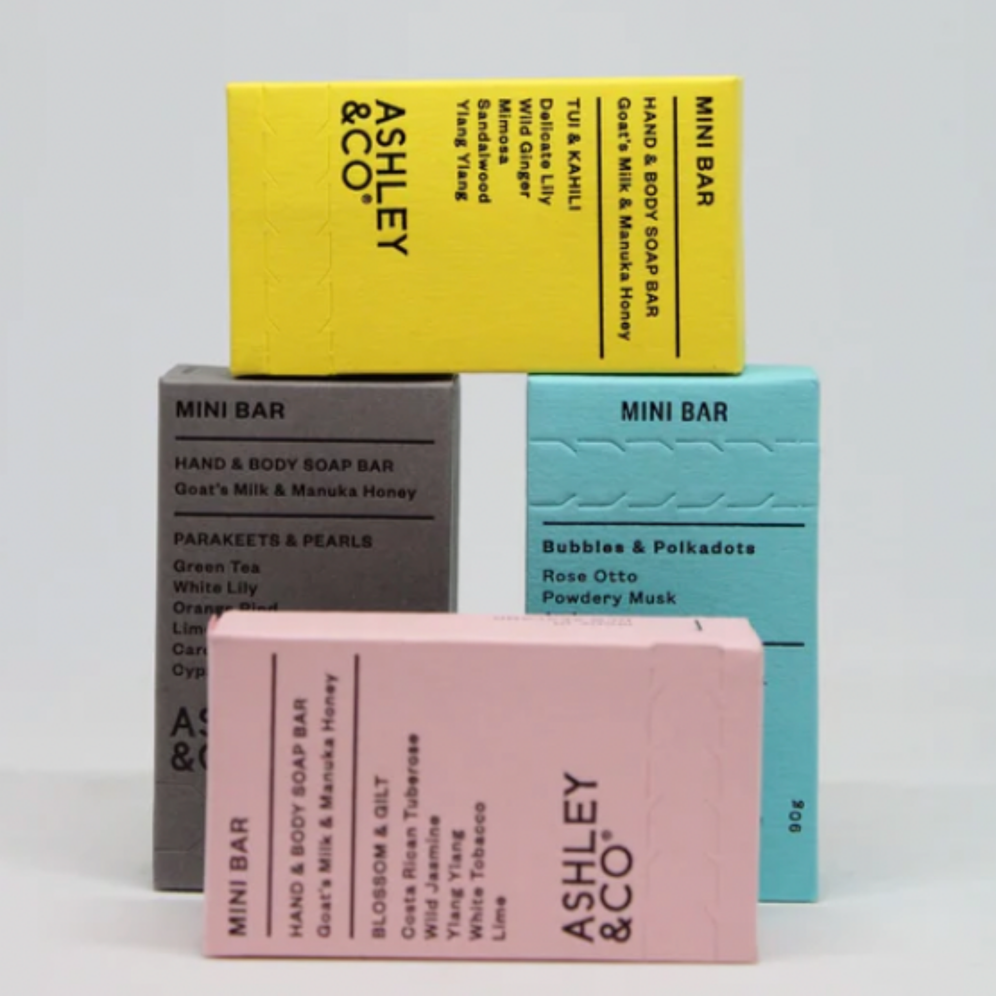 Assorted Ashley & Co cleansing bars stacked all together 