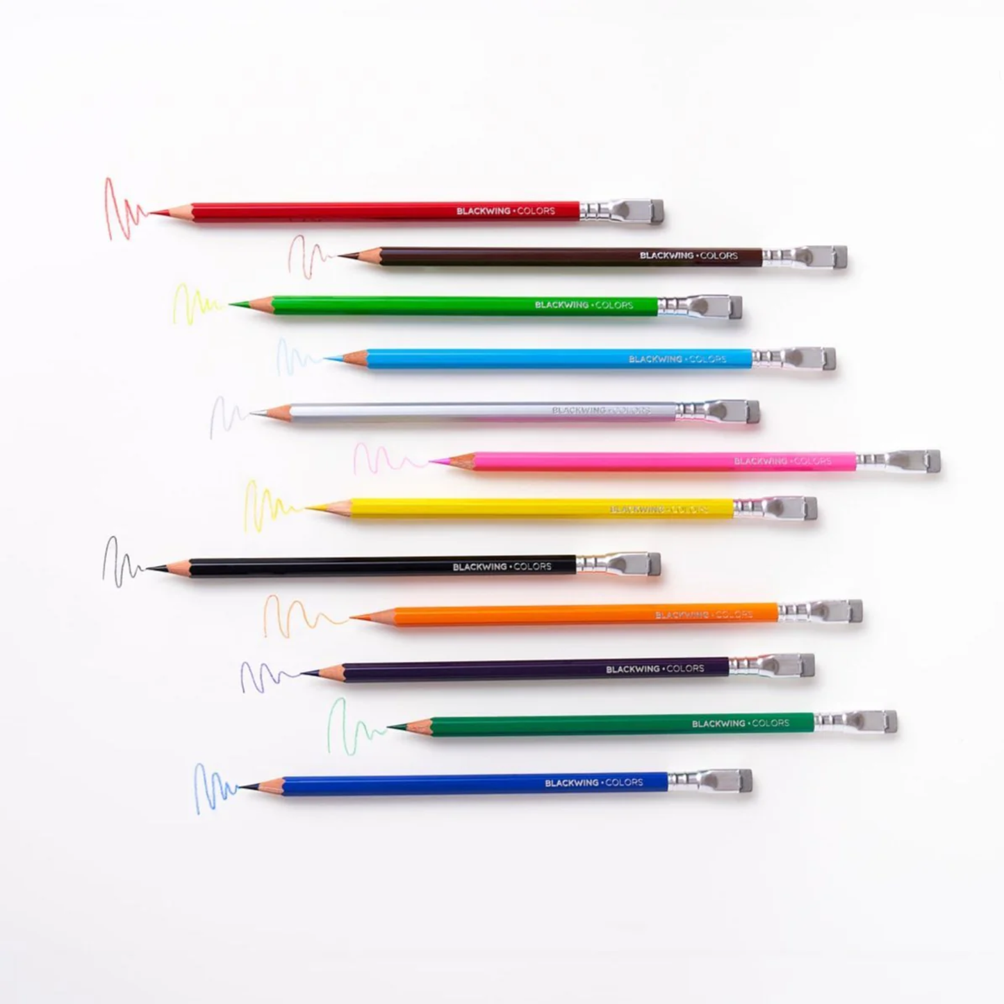 Showing 12 color pencils with their color writings from Blackwing Colors Set of 12 colored pencils, premium incense-cedar pencils with smooth Japanese wax cores, silver ferrule, and sand erasers made for colored pencils.