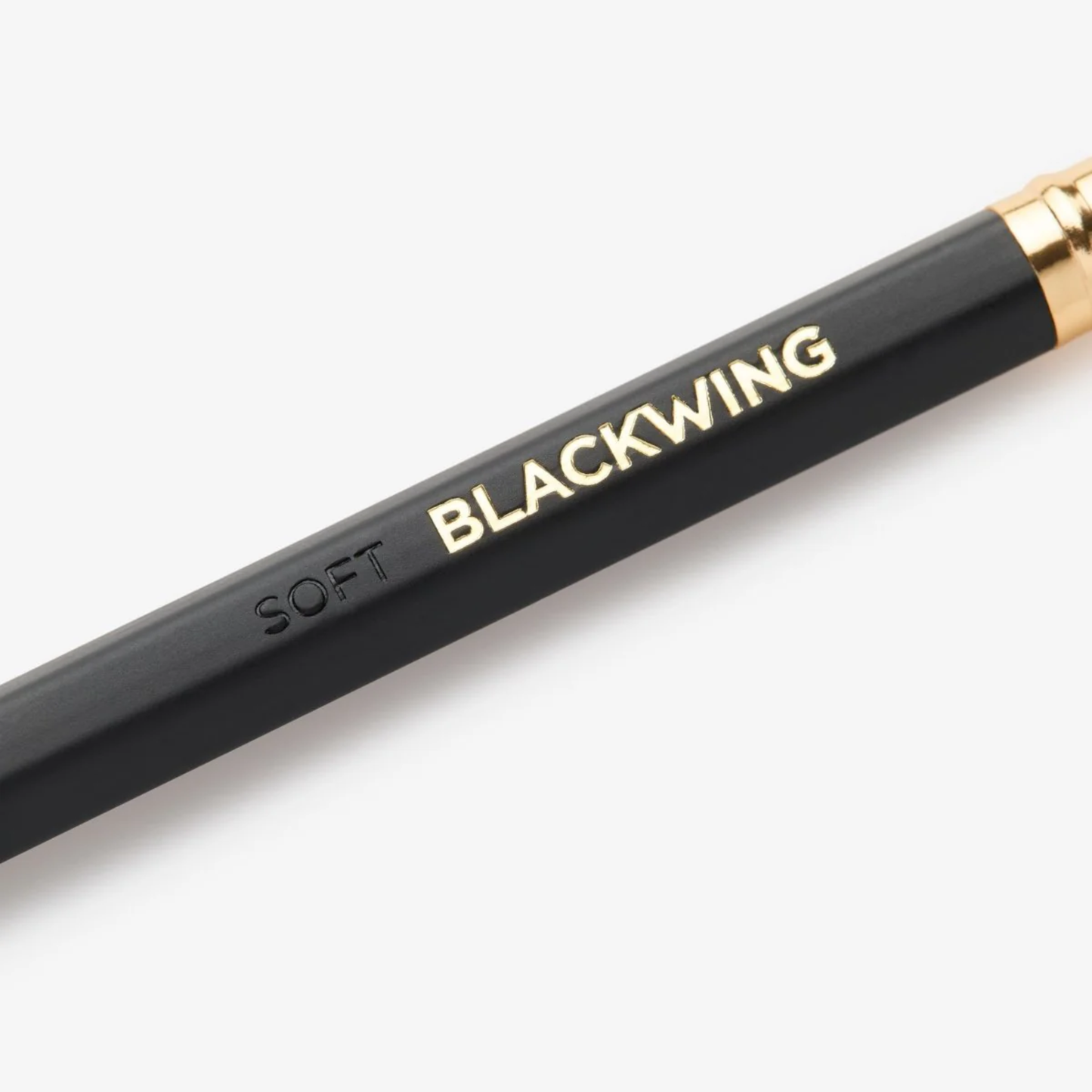 Close up of Handwriting shown using Blackwing Matte black pencil with soft graphite core and square metal ferrule.