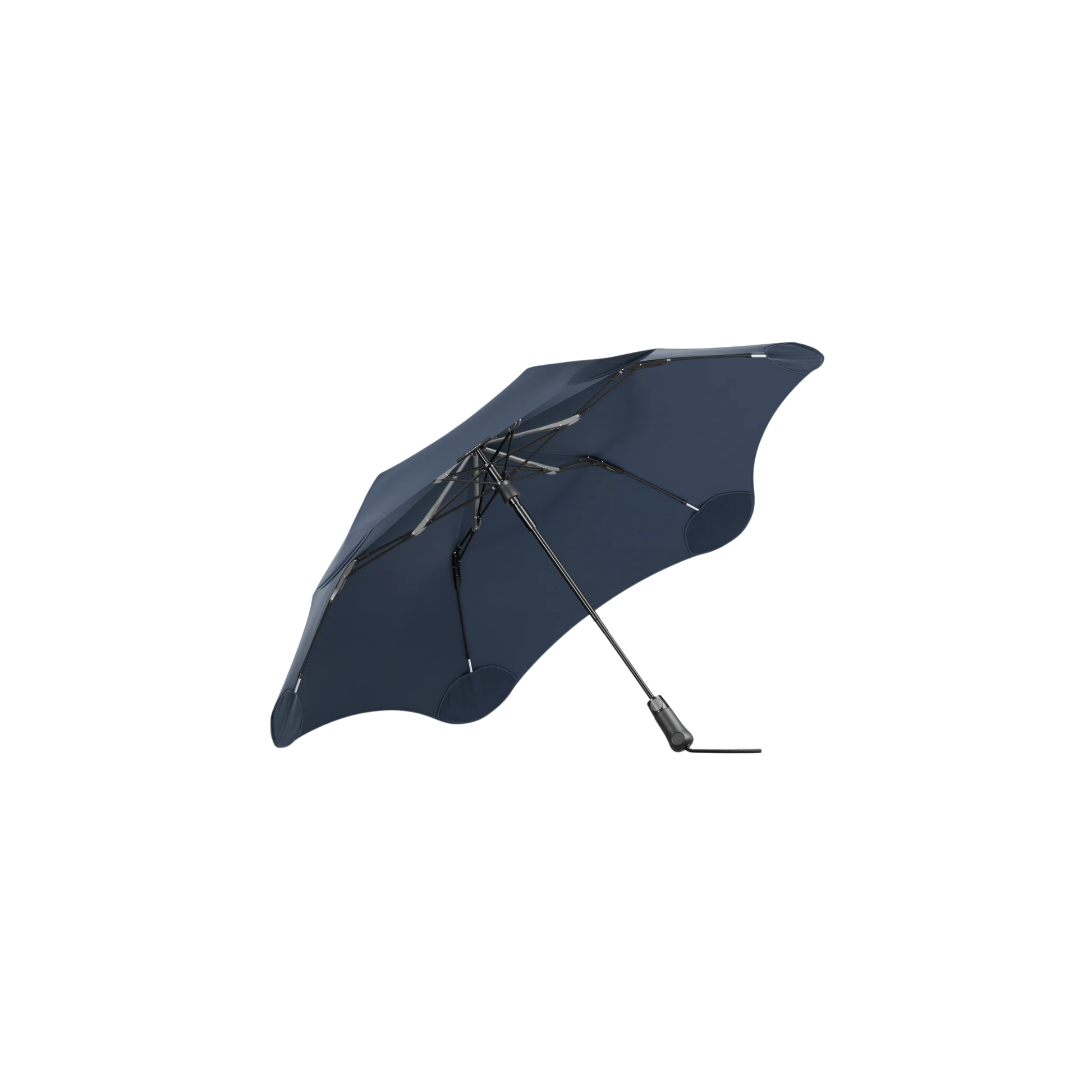 Side view and showing the inner side of the open Blunt Umbrella Metro Midnight Navy, which is compact, collapsible and convenient, consisting of the detachable UV fabric canopy, sturdy frame, shaft and handle. Fits in your handbag, tote or backpack. Built for fast living, those who travel light, and any weather.
