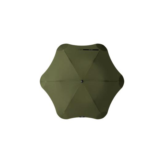 Top view of the Blunt Umbrella Metro Moss Green, a timeless, compact, collapsible and convenient, consisting of the detachable UV fabric canopy, sturdy frame, shaft and handle. Fits in your handbag, tote or backpack. Built for fast living, those who travel light, and any weather.