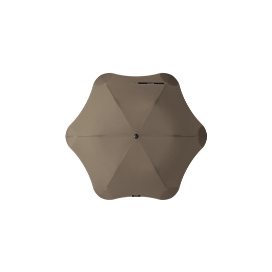 Top view of the Muted tone Blunt Umbrella Metro Pebble especially made for those who appreciate understated quality. Compact, collapsible and convenient, consisting of the detachable UV fabric canopy, sturdy frame, shaft and handle. Fits in your handbag, tote or backpack. Built for fast living, those who travel light, and any weather.