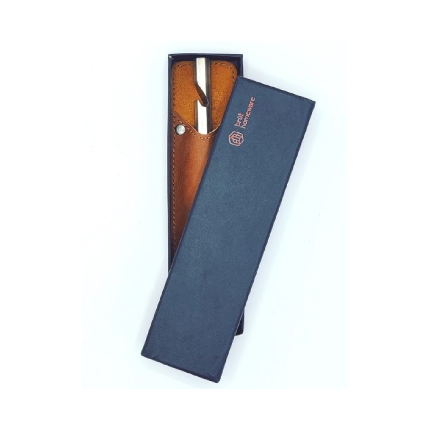 Shown with a box Brut Homeware burnt stainless steel bottle opener with custom buffalo leather sleeve, handcrafted in India, heavyweight 230g design for durable and stylish use, ideal as a luxury or barware gift.