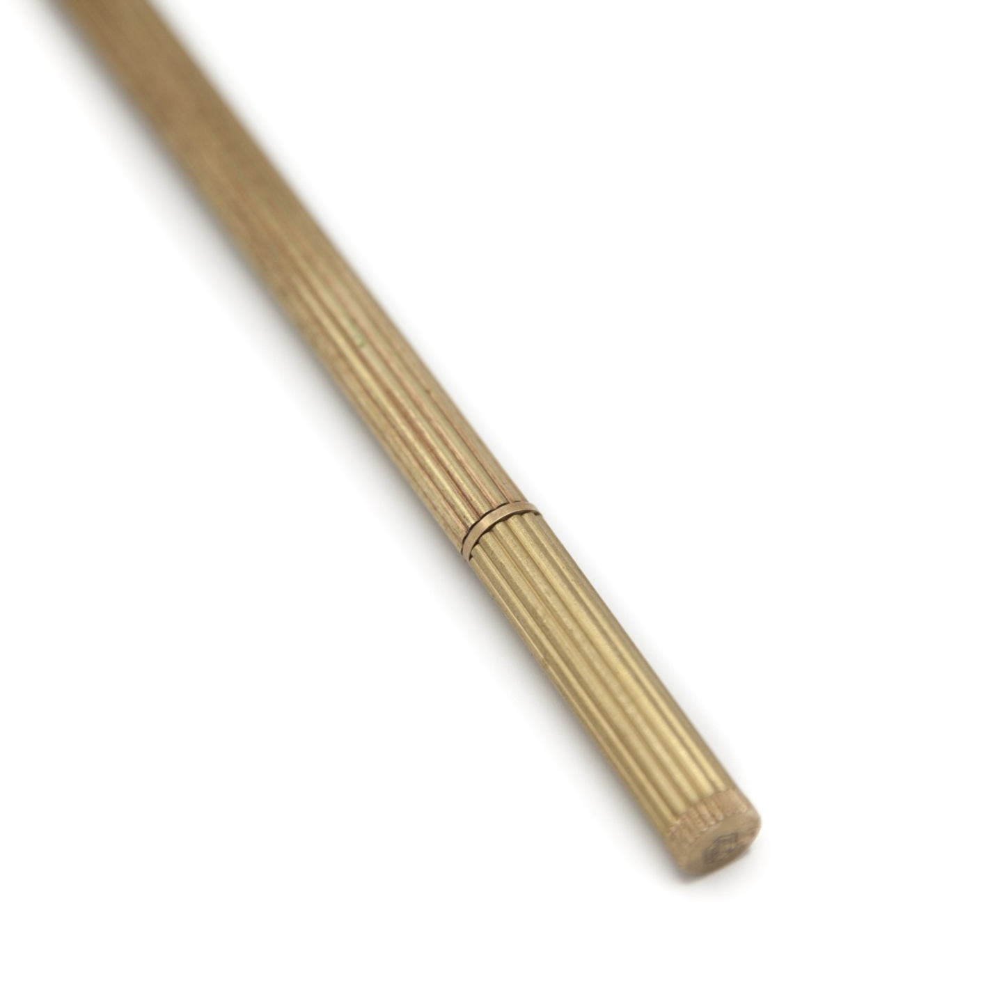 Close up Brut Homeware luxury brass pen with a gold-toned finish, refillable Schmidt P900 ink, and black gift box - a heavyweight handmade writing tool ideal for gifting or desk display.