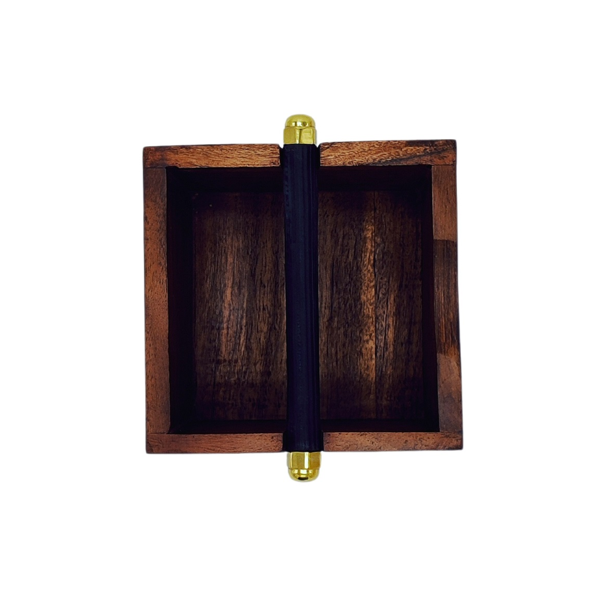 A square, dark wooden Coffee Knock Box by Brut features a central black and gold cylindrical handle, shown from above against a white background.