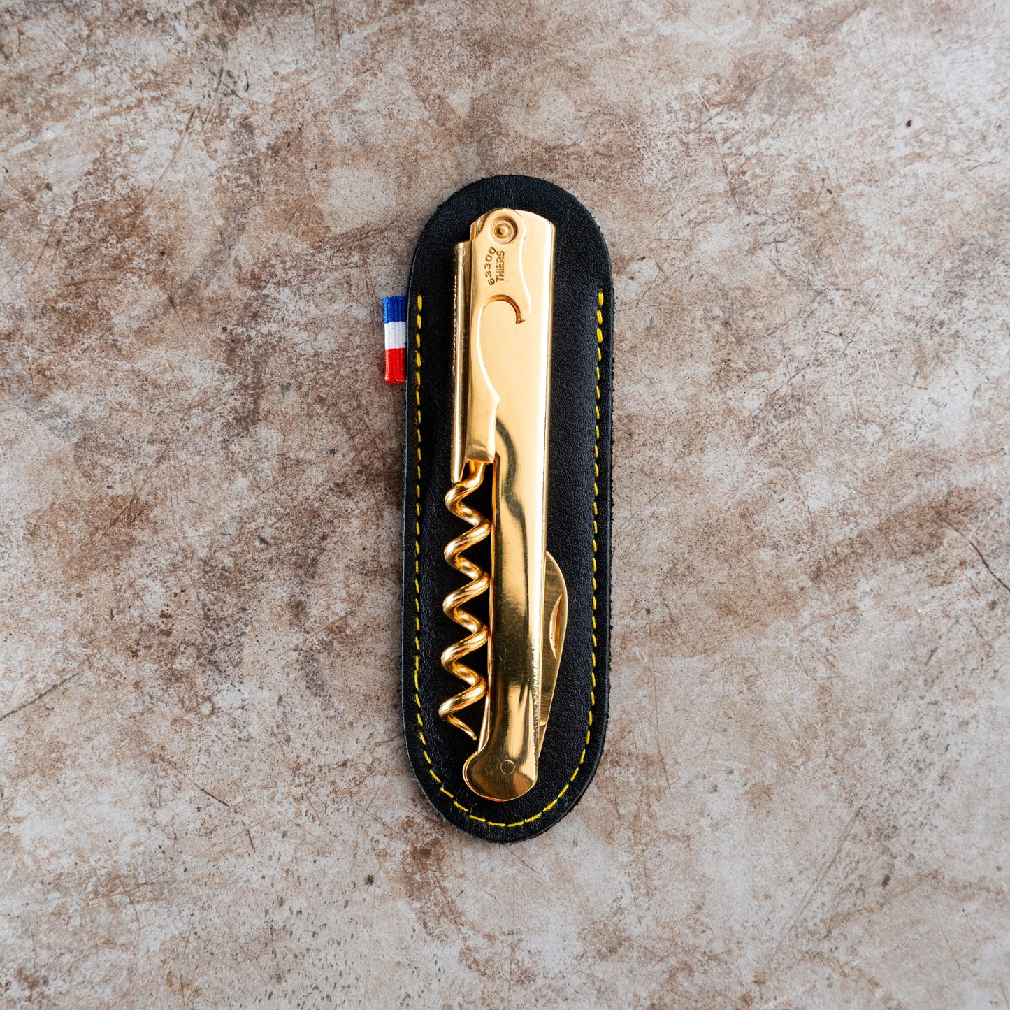 Cartailler Deluc The Original 92 Waiters Corkscrew Leather Pouch from high quality black leather with yellow stitches with corkscrew on top.