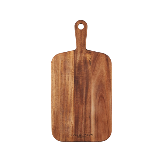 Front view of Cole & Mason small double-sided acacia wood chopping board, natural finish, 2.5 cm thick, with handle and hanging hole for chopping, slicing, and serving.