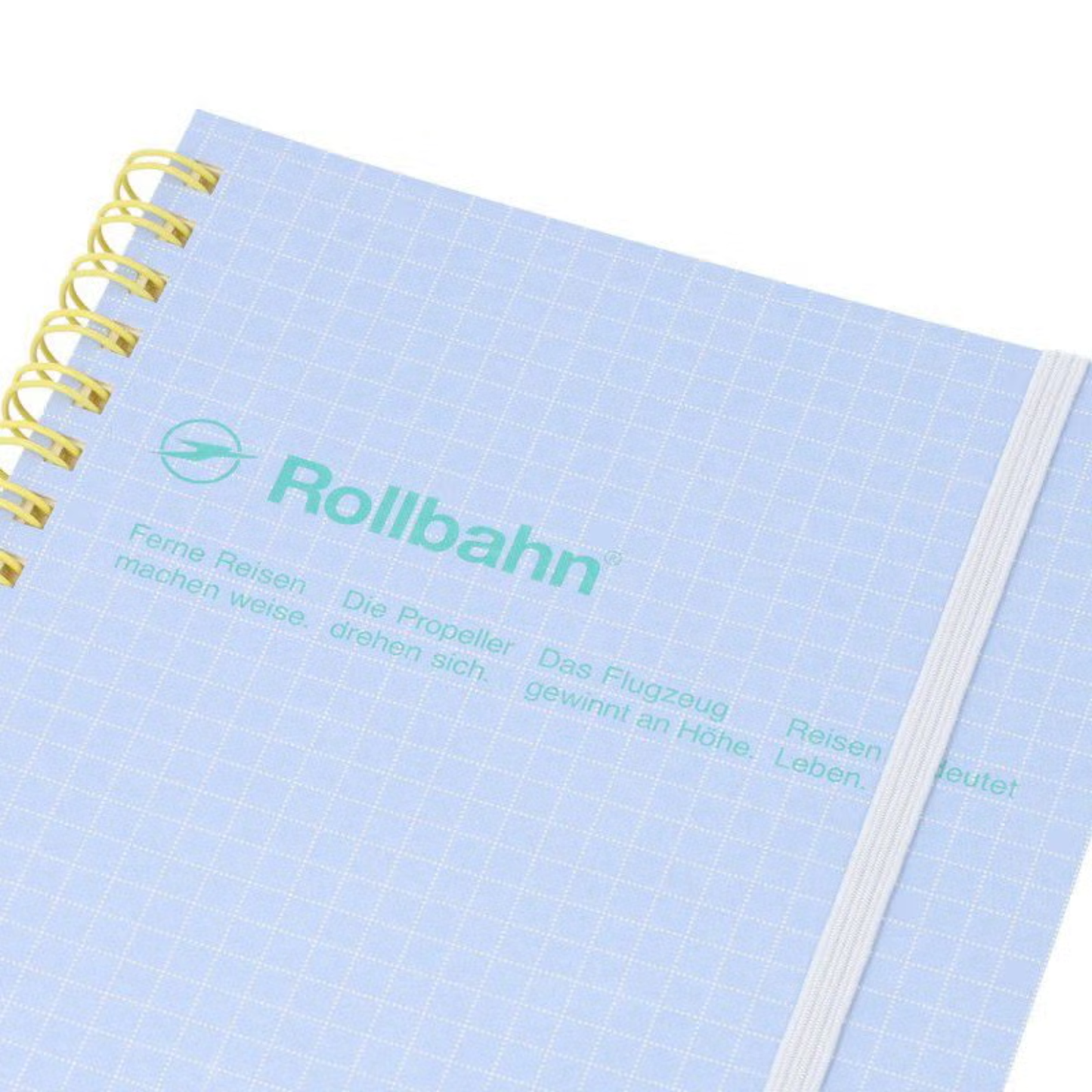 Close up view of the Fathom spiral bound retro notebook in light blue with polypropylene cover, metal spiral binding, elastic closure, and 140 perforated cream pages, large Japanese-made stationery.